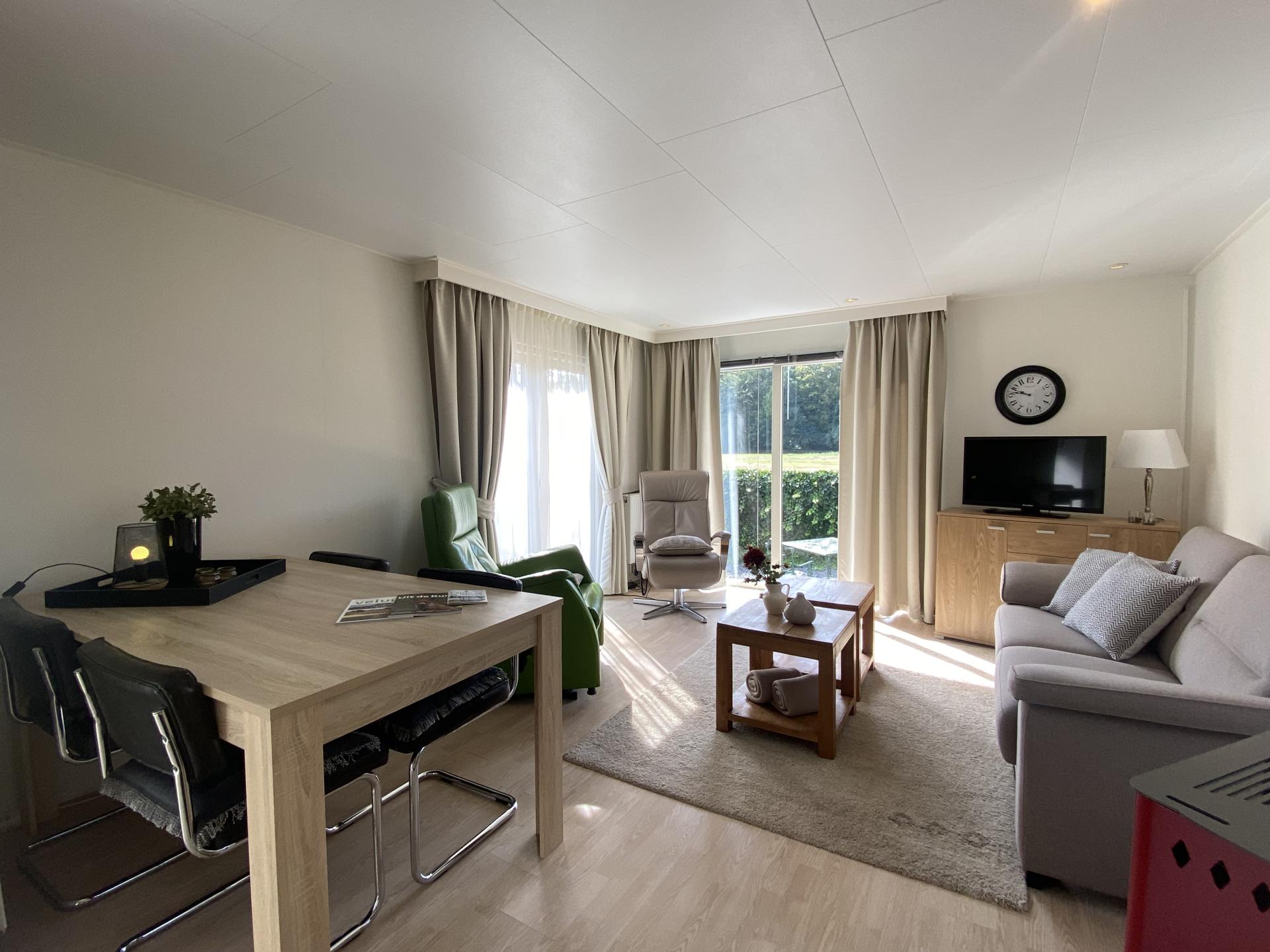 Knus chalet met panoramisch uitzicht op de Veluwse bossen - foto 11