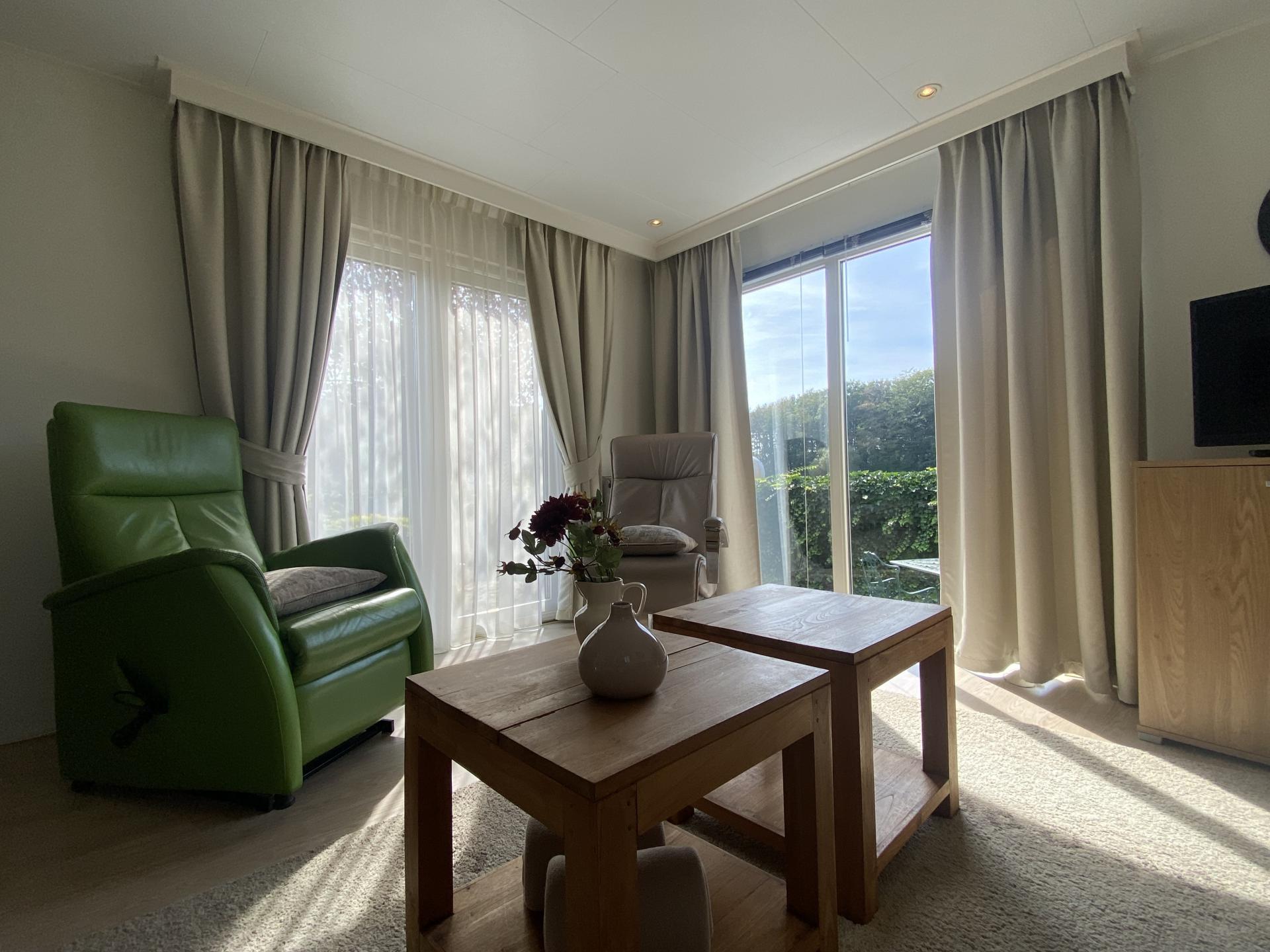 Knus chalet met panoramisch uitzicht op de Veluwse bossen - foto 16