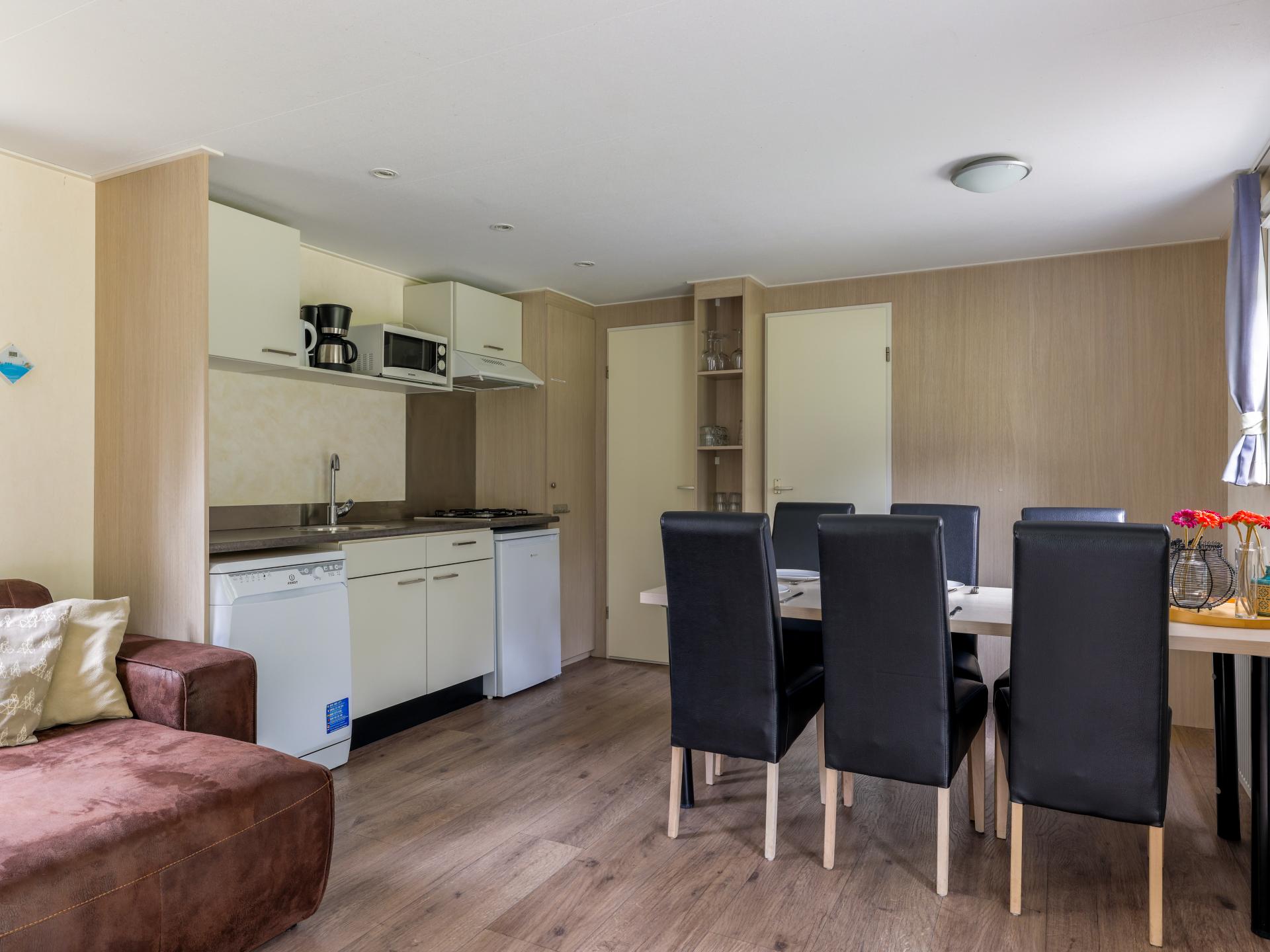 Chalet op bosrijke Brabantse camping met zwembad en avonturenpad - foto 8