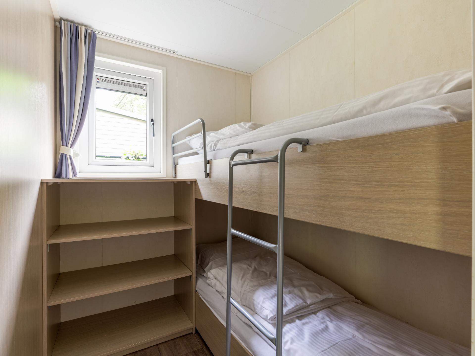 Chalet op bosrijke Brabantse camping met zwembad en avonturenpad - foto 16