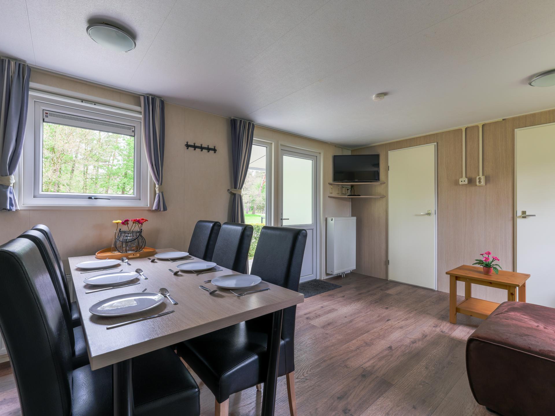 Chalet op bosrijke Brabantse camping met zwembad en avonturenpad - foto 10