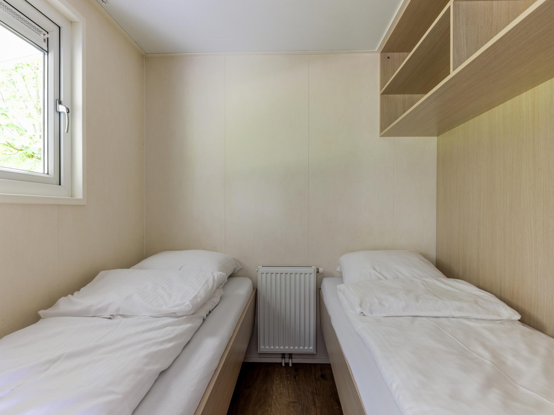 Chalet op bosrijke Brabantse camping met zwembad en avonturenpad - foto 15