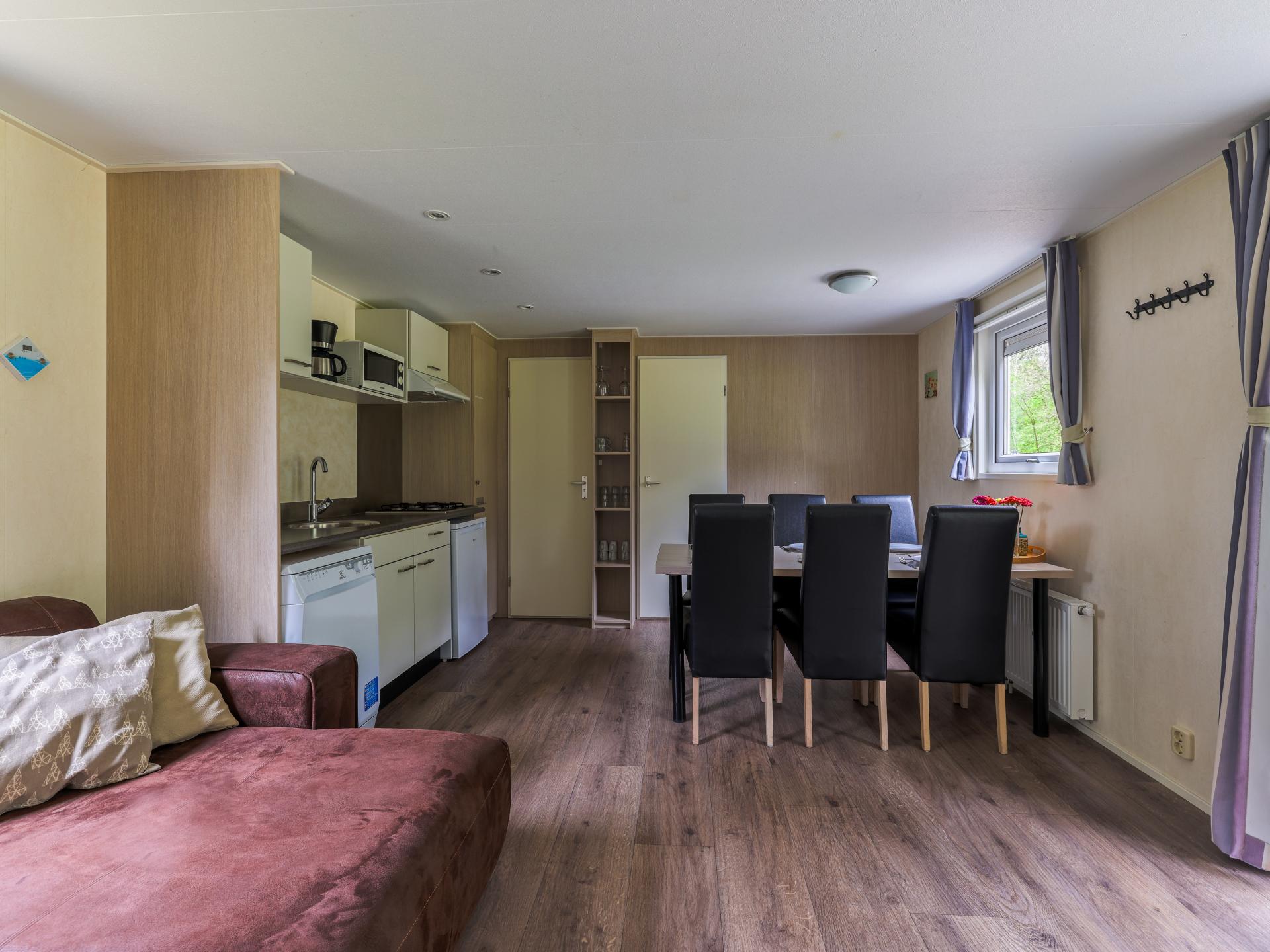 Chalet op bosrijke Brabantse camping met zwembad en avonturenpad - foto 7
