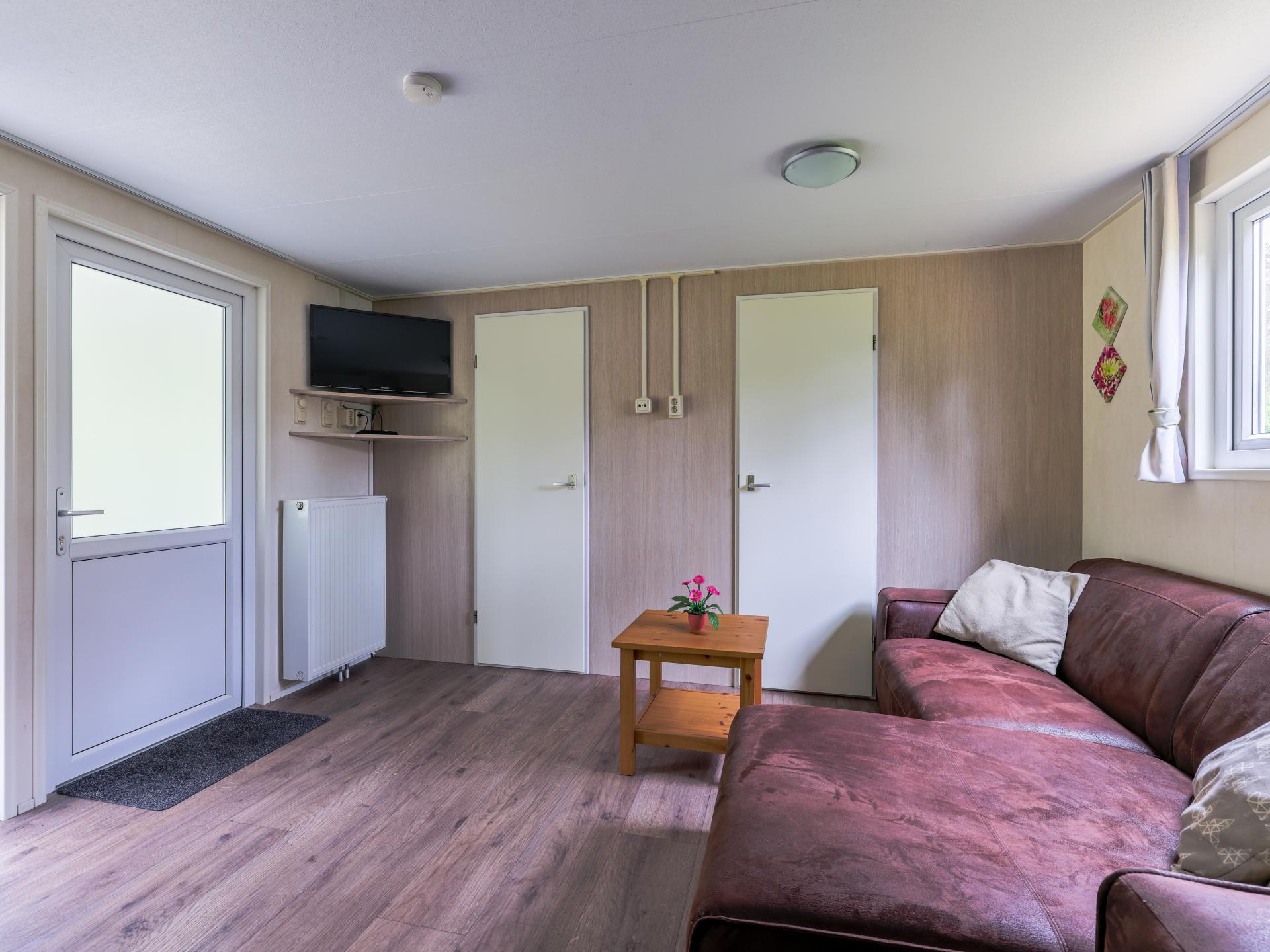 Chalet op bosrijke Brabantse camping met zwembad en avonturenpad - foto 6