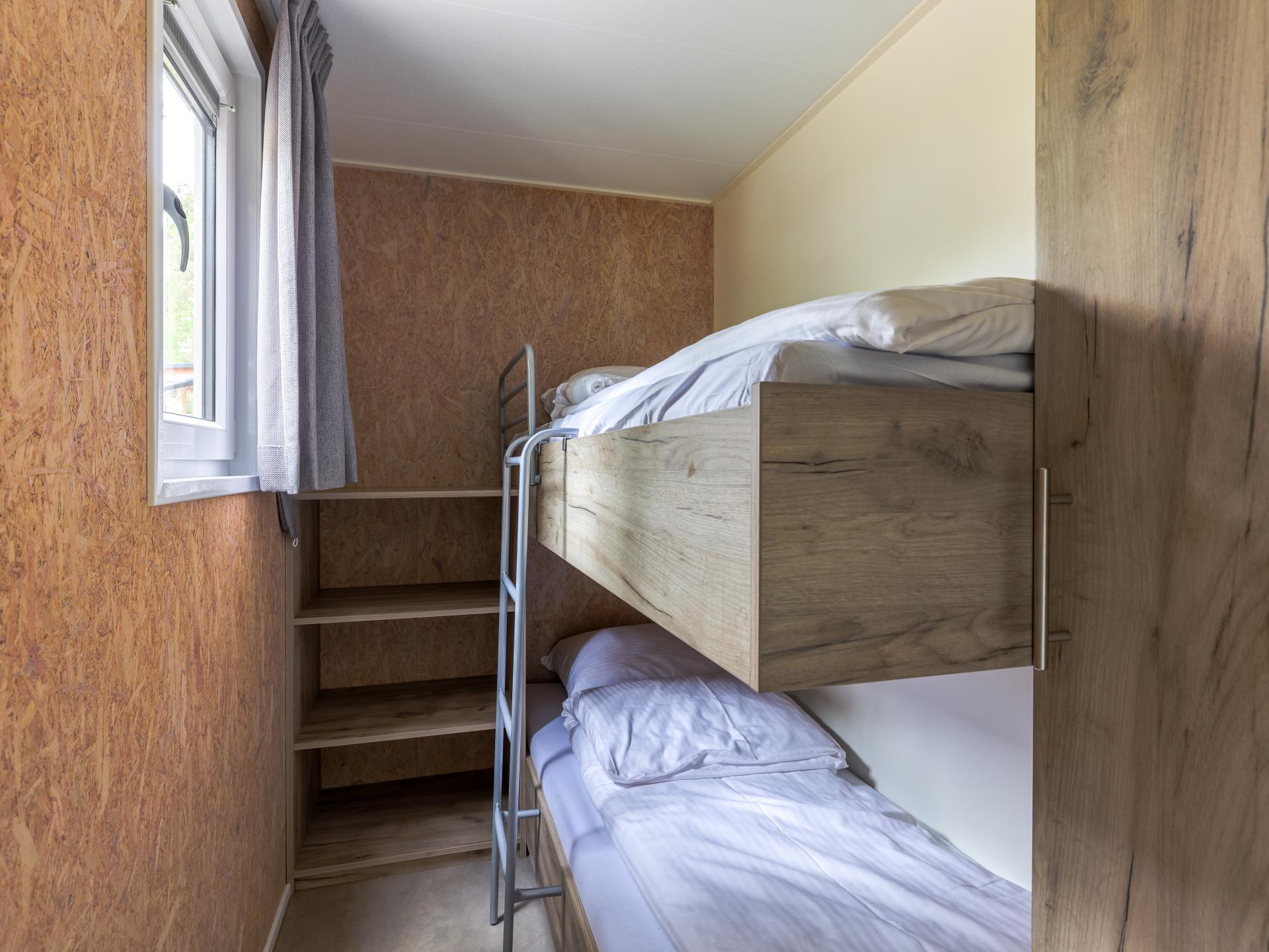 Gezellig chalet op bosrijke camping met zwembad in Vessem - foto 11