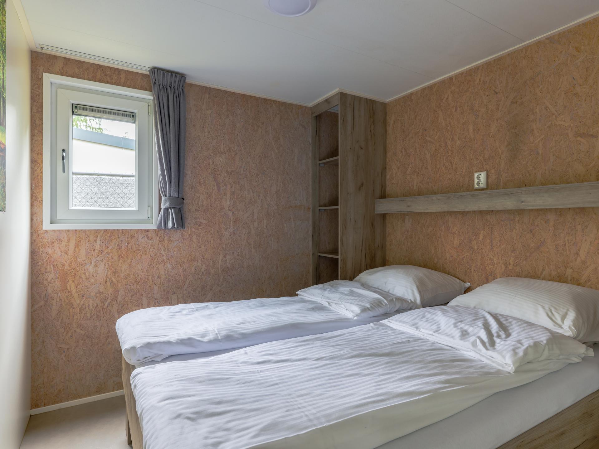 Gezellig chalet op bosrijke camping met zwembad in Vessem - foto 10