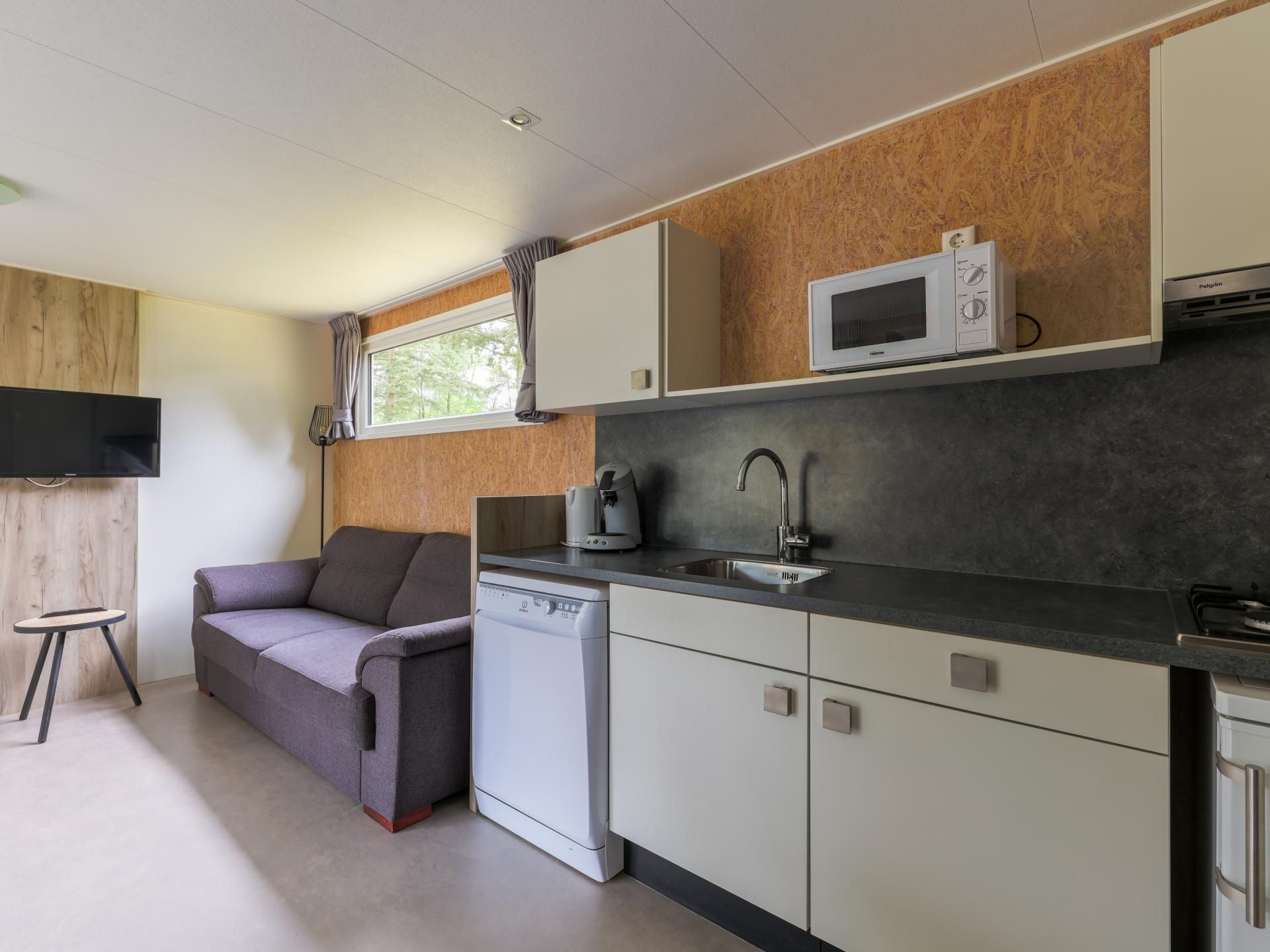 Gezellig chalet op bosrijke camping met zwembad in Vessem - foto 8