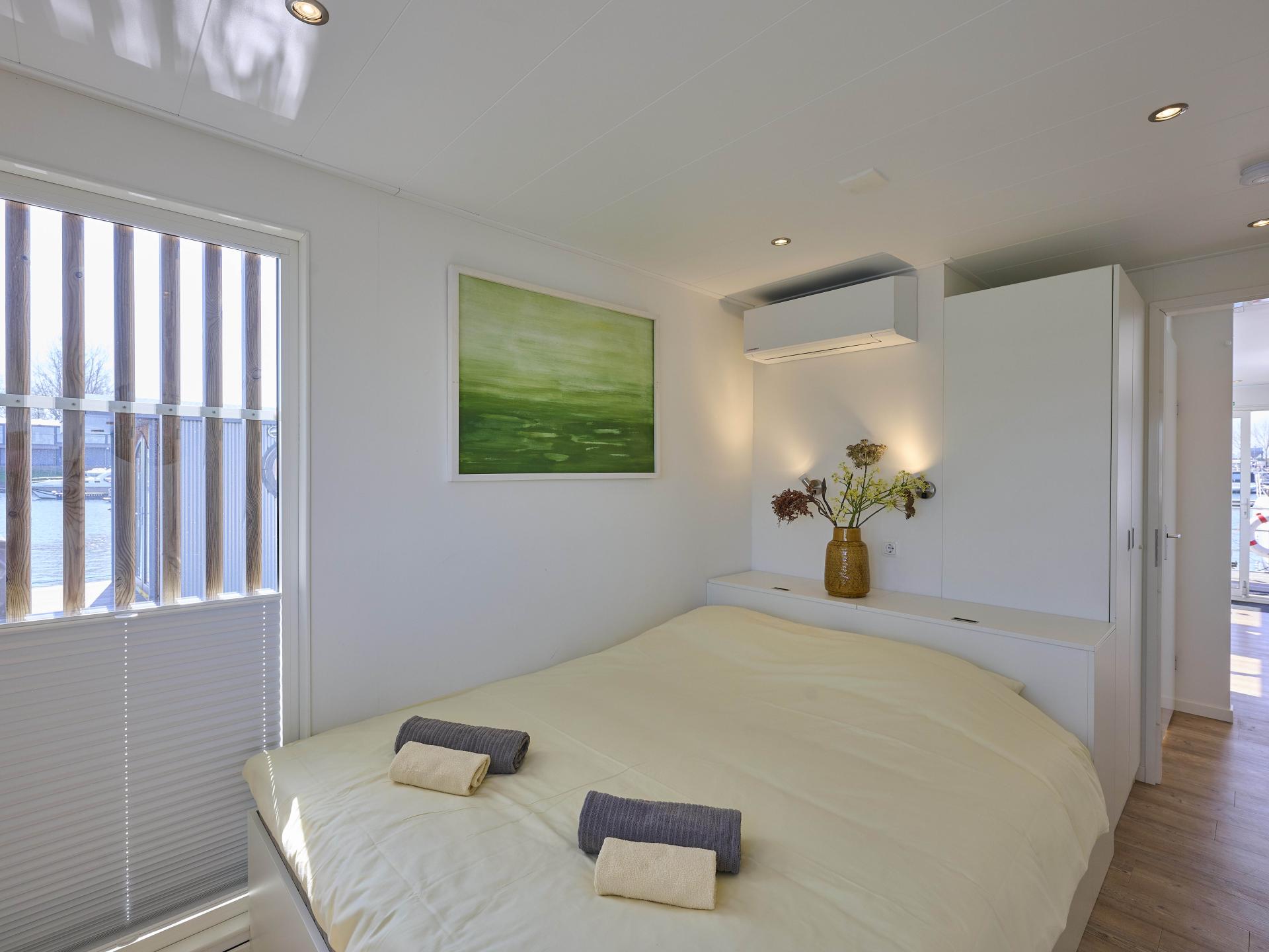 Luxe huisboot met panoramisch dakterras in haven van Kerkdriel - foto 6