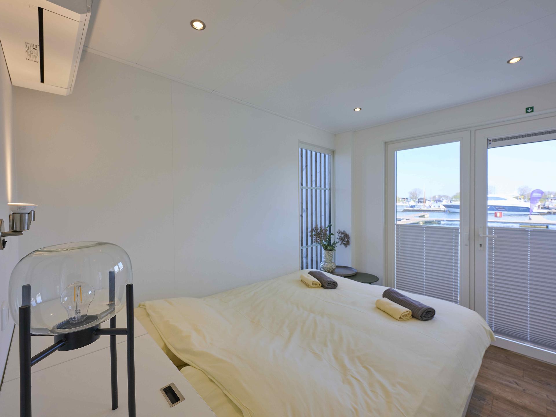 Luxe huisboot met panoramisch dakterras in haven van Kerkdriel - foto 15