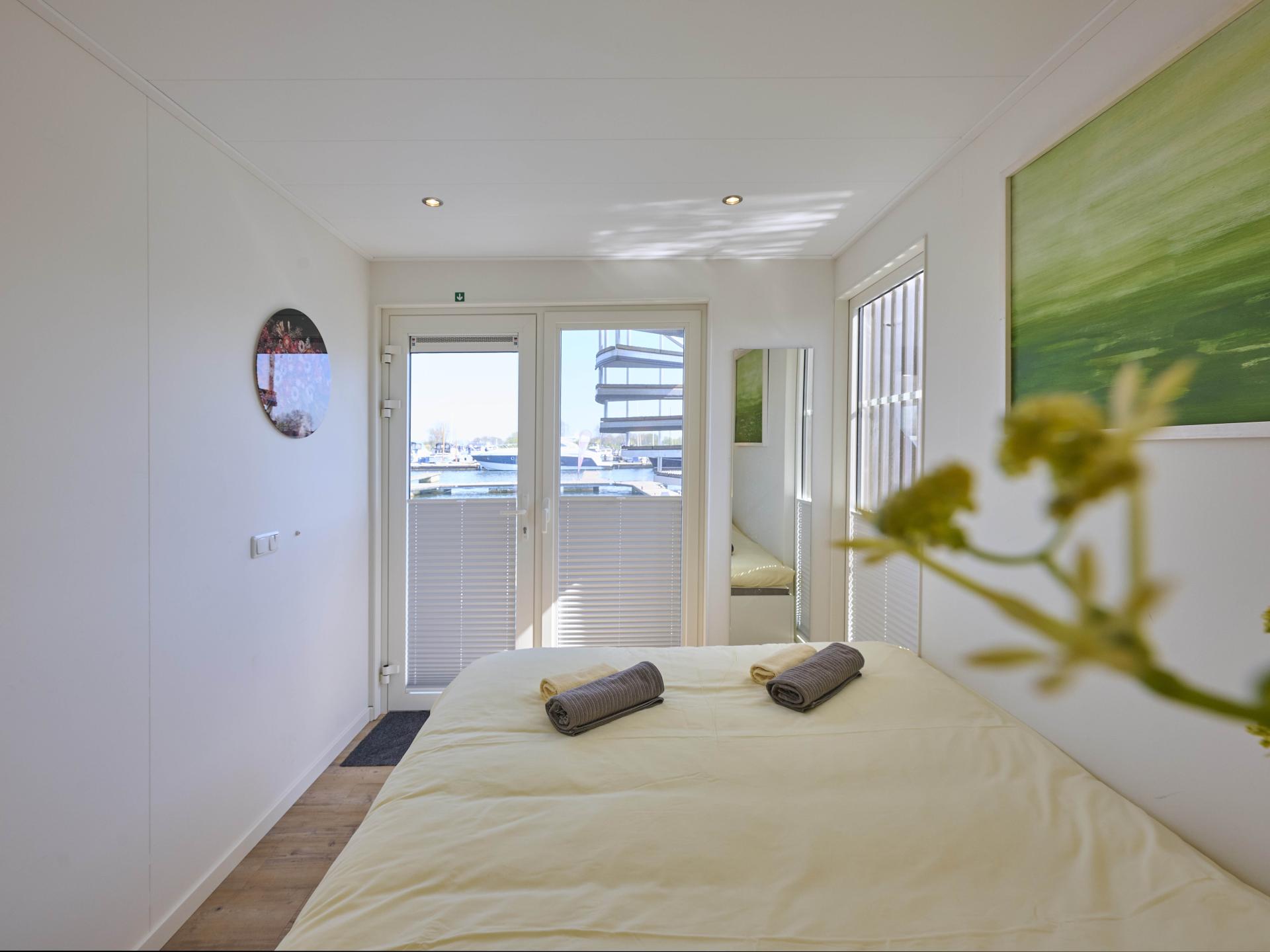 Luxe huisboot met panoramisch dakterras in haven van Kerkdriel - foto 13