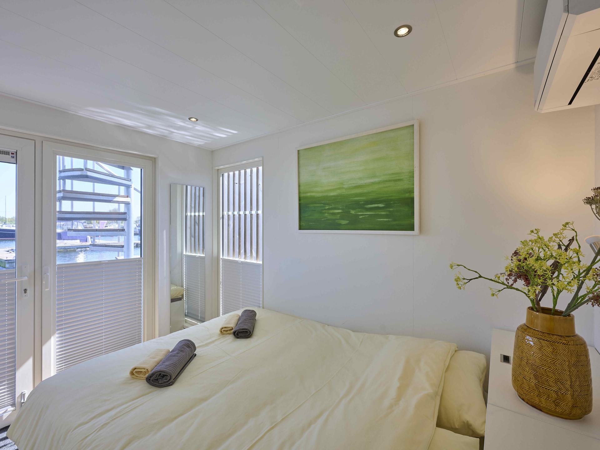 Luxe huisboot met panoramisch dakterras in haven van Kerkdriel - foto 16