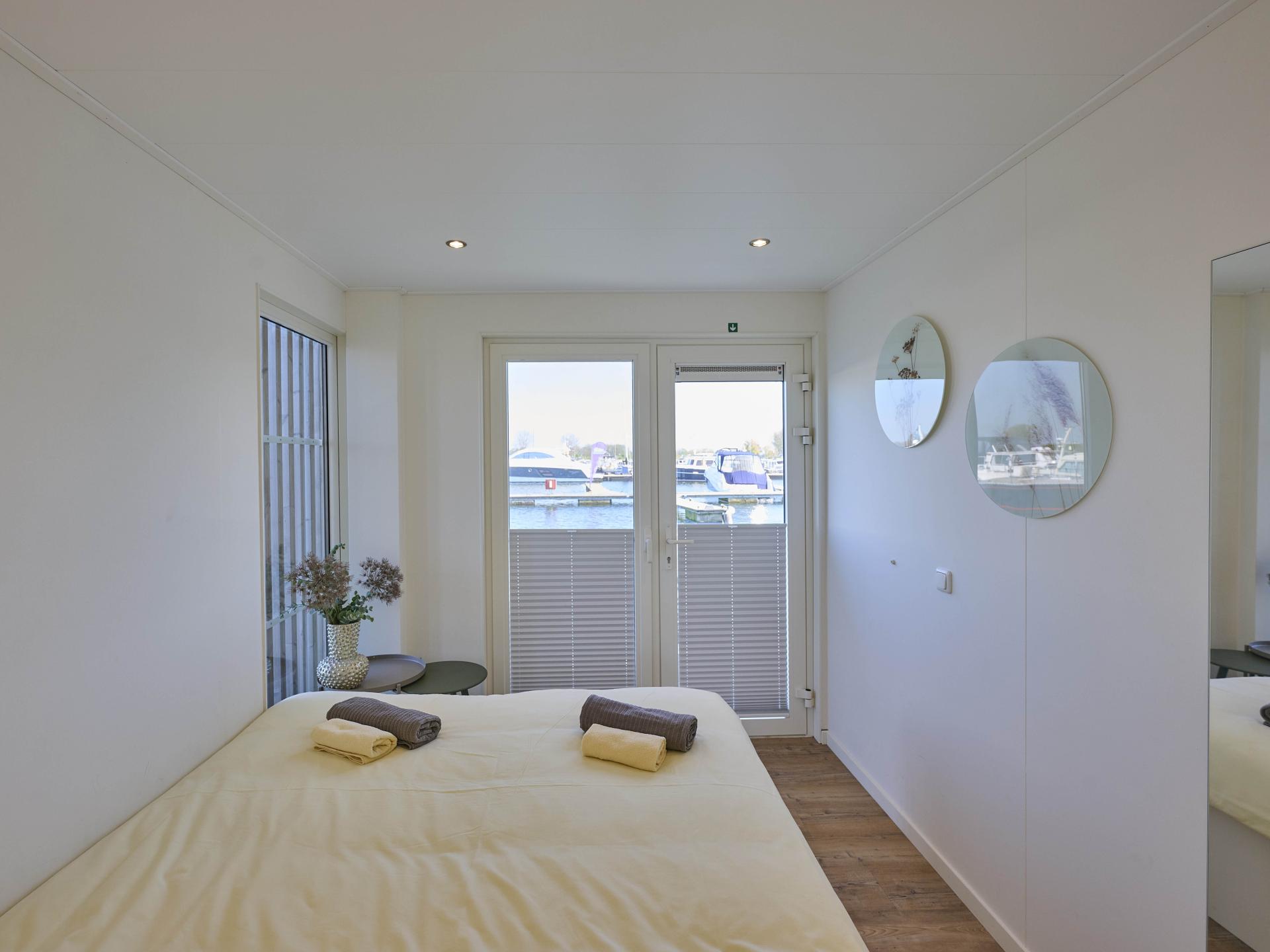 Luxe huisboot met panoramisch dakterras in haven van Kerkdriel - foto 14
