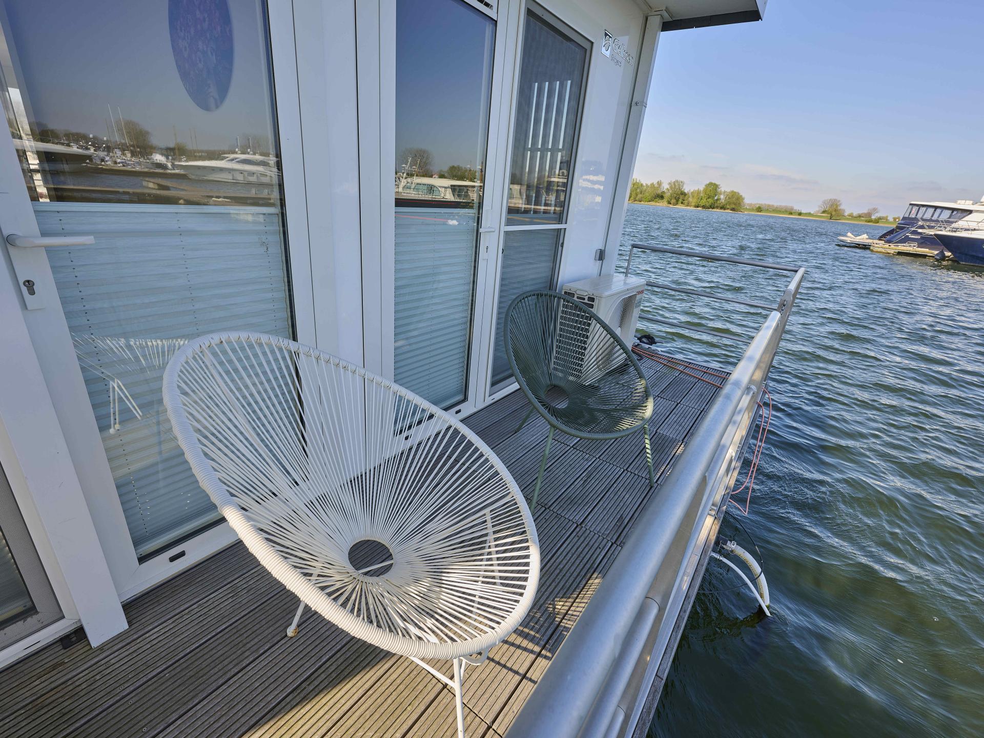 Luxe huisboot met panoramisch dakterras in haven van Kerkdriel - foto 23
