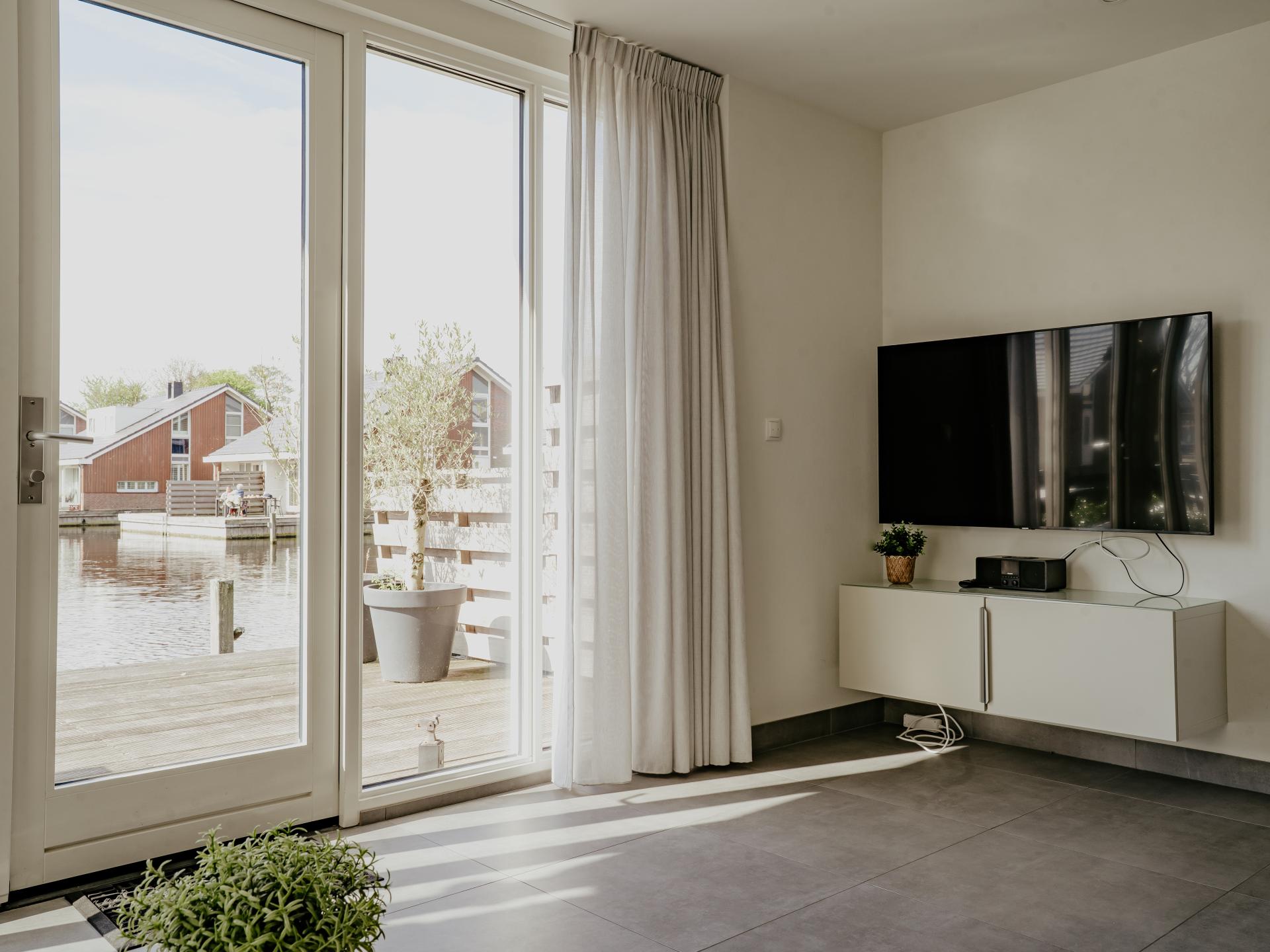 Luxe gelijkvloers appartement met waterterras in hartje Uitgeest - foto 4