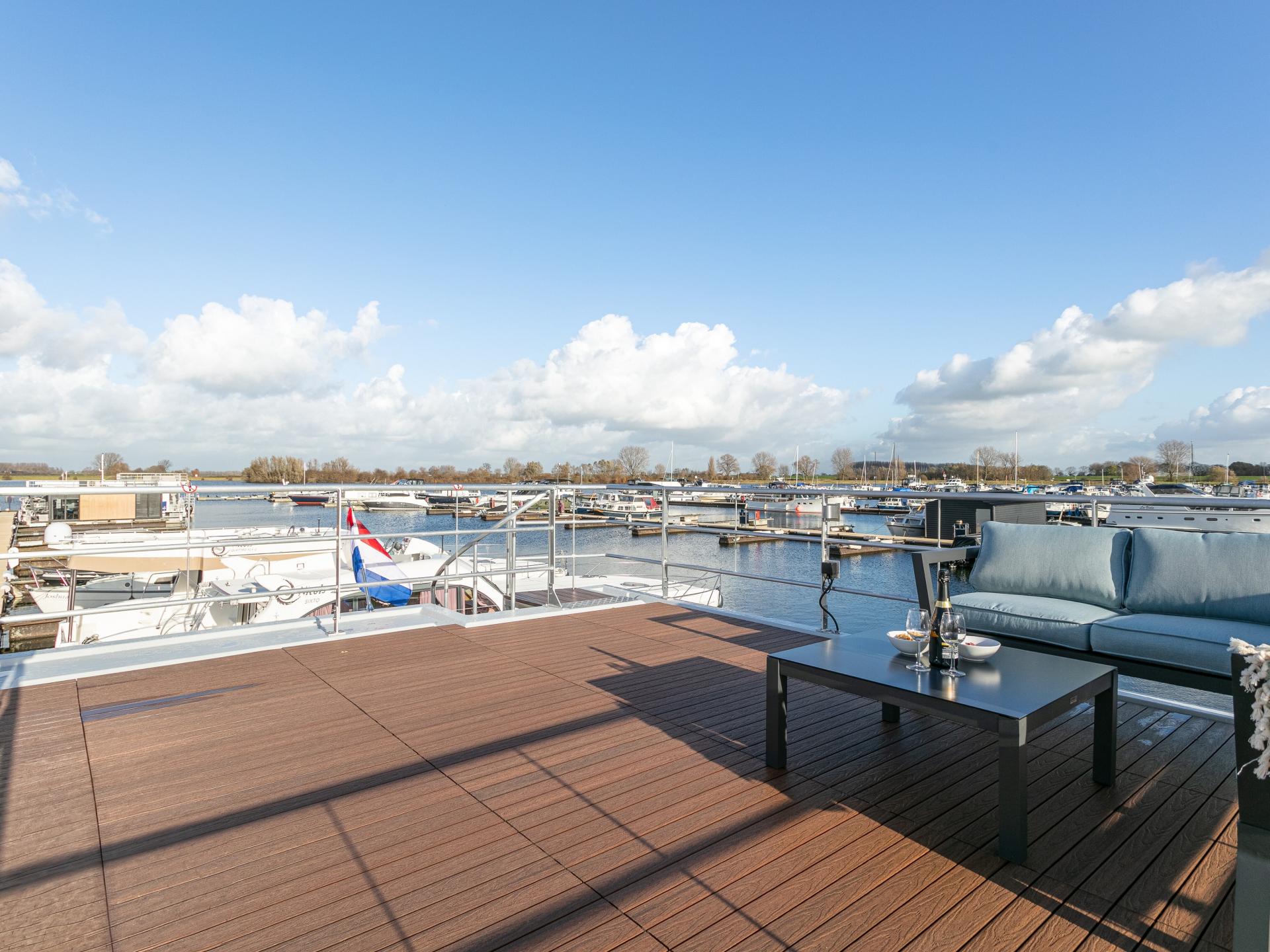 Woonboot met dakterras in schilderachtige haven van Kerkdriel - foto 27