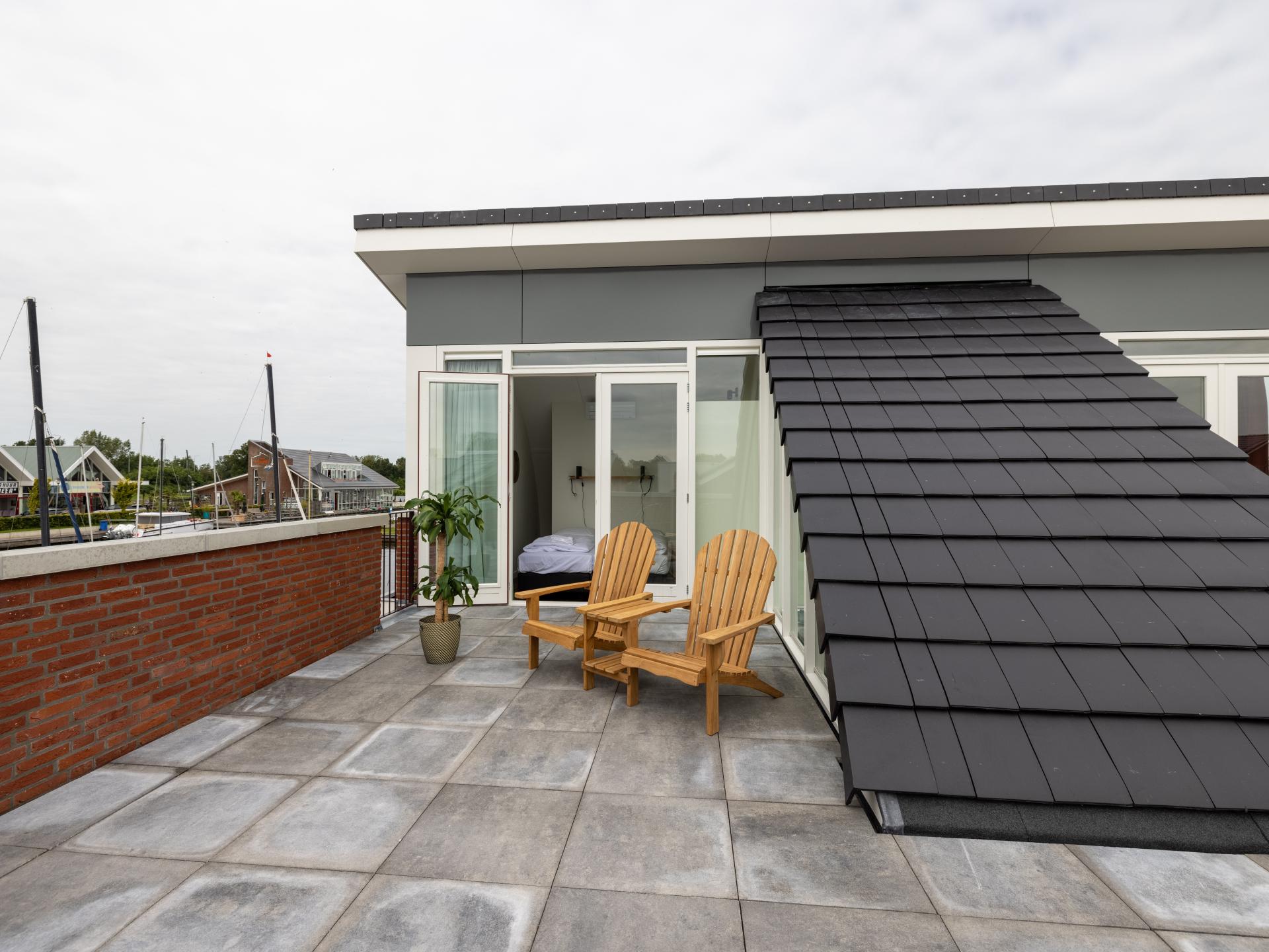 Luxe watervilla Uitgeest: 2 badkamers, dakterras & direct aan het water - foto 21