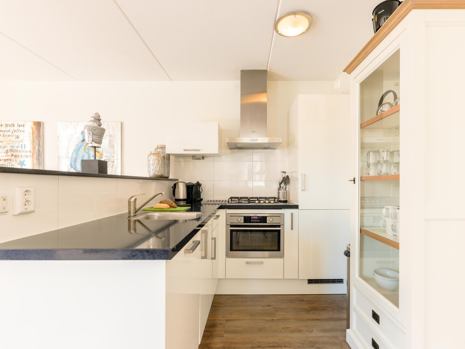 Ruim 12-persoons appartement met privé aanlegsteiger aan het Uitgeestermeer - foto 6