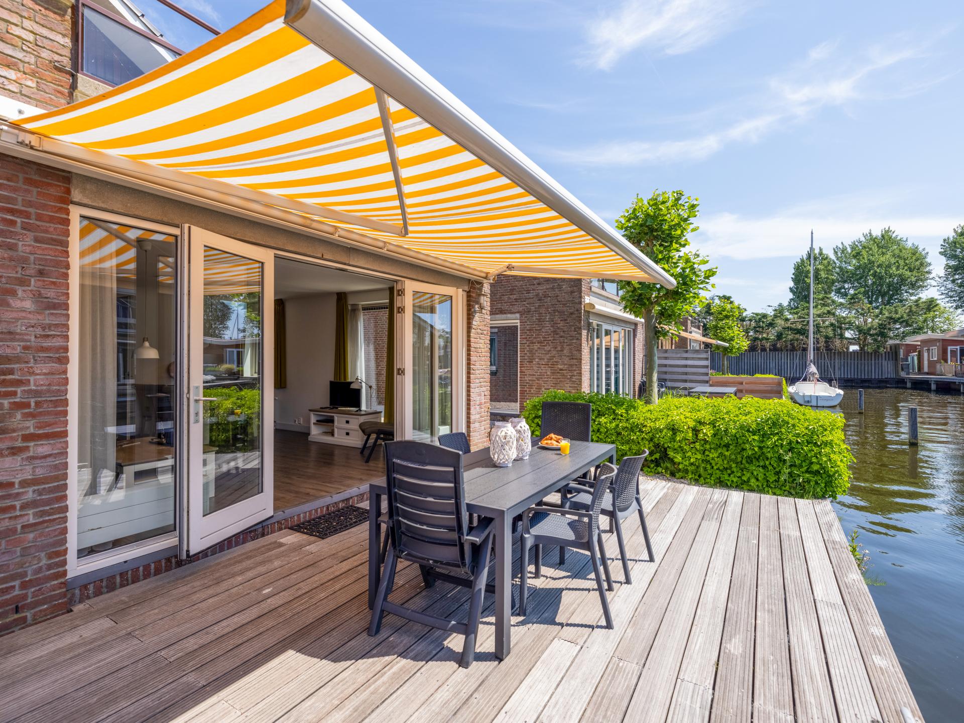 Ruim 12-persoons appartement met privé aanlegsteiger aan het Uitgeestermeer - foto 19