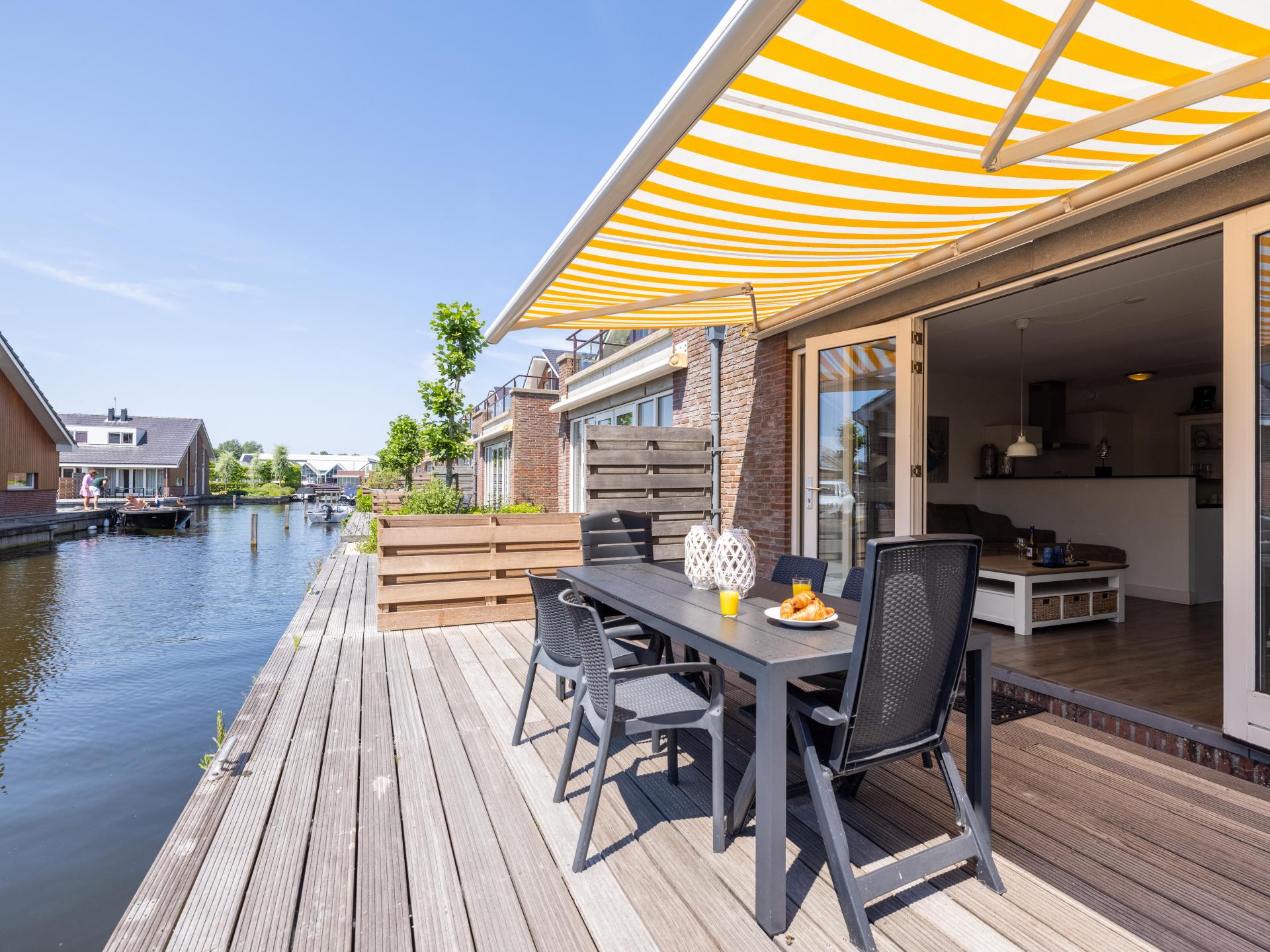 Ruim 12-persoons appartement met privé aanlegsteiger aan het Uitgeestermeer - foto 2