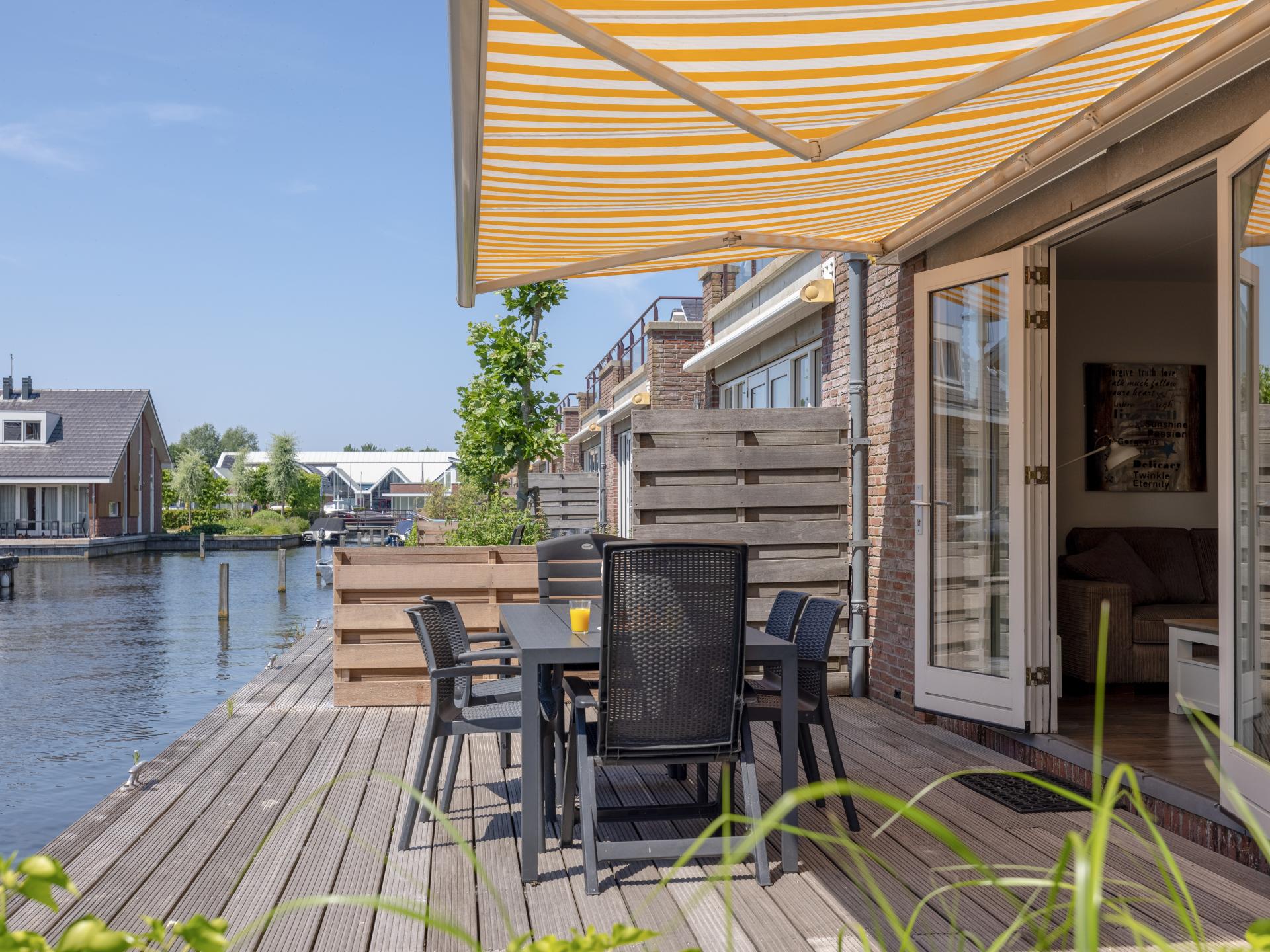 Ruim 12-persoons appartement met privé aanlegsteiger aan het Uitgeestermeer - foto 18