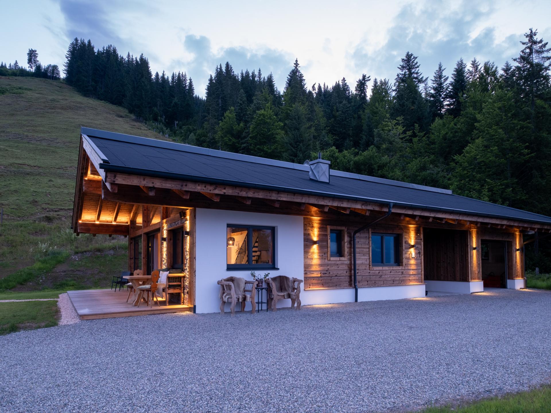 Luxe chalet in Sankt Johann met privé sauna en natuurlijke zwemvijver - foto 28