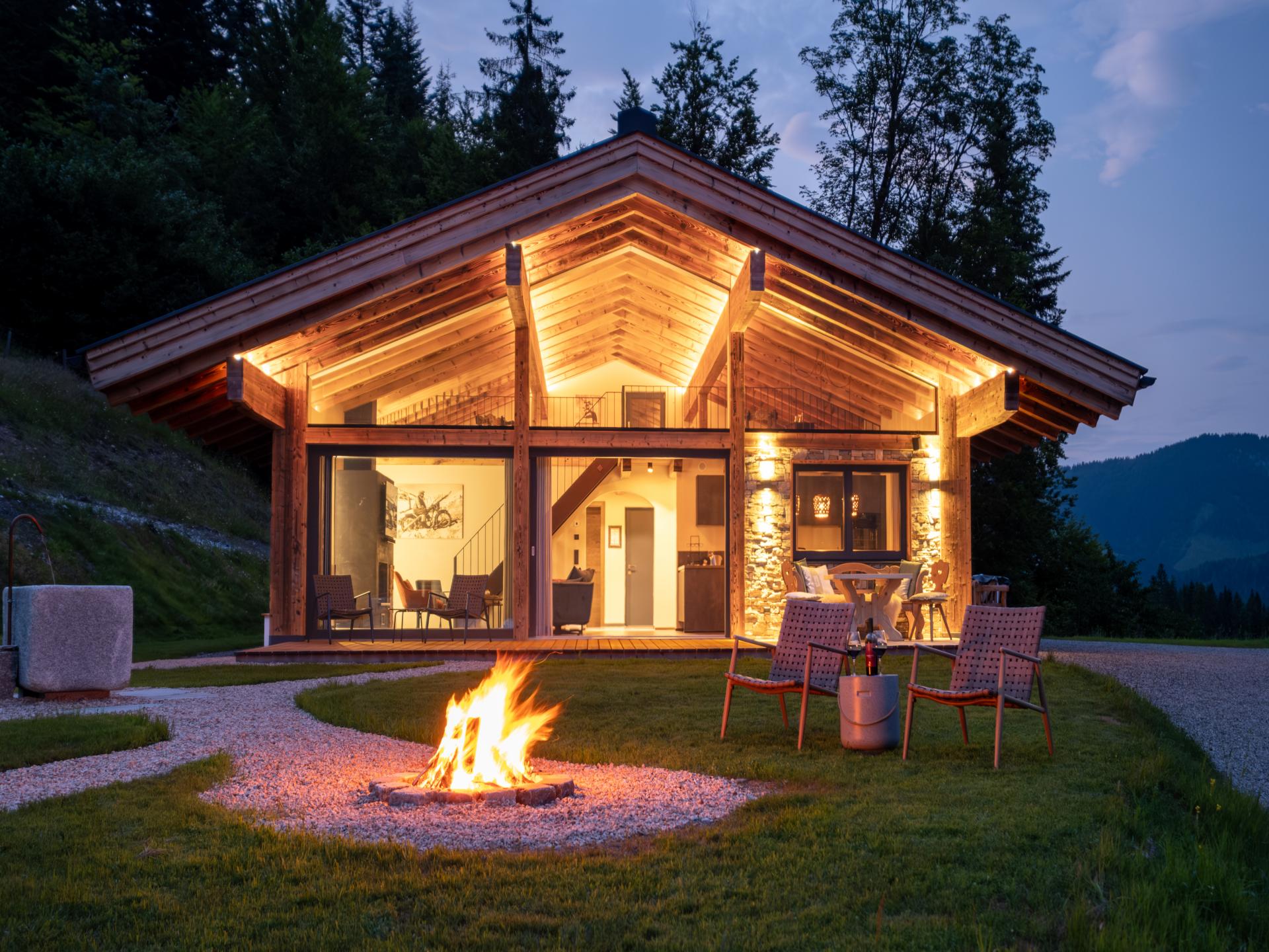 Luxe chalet in Sankt Johann met privé sauna en natuurlijke zwemvijver - foto 29