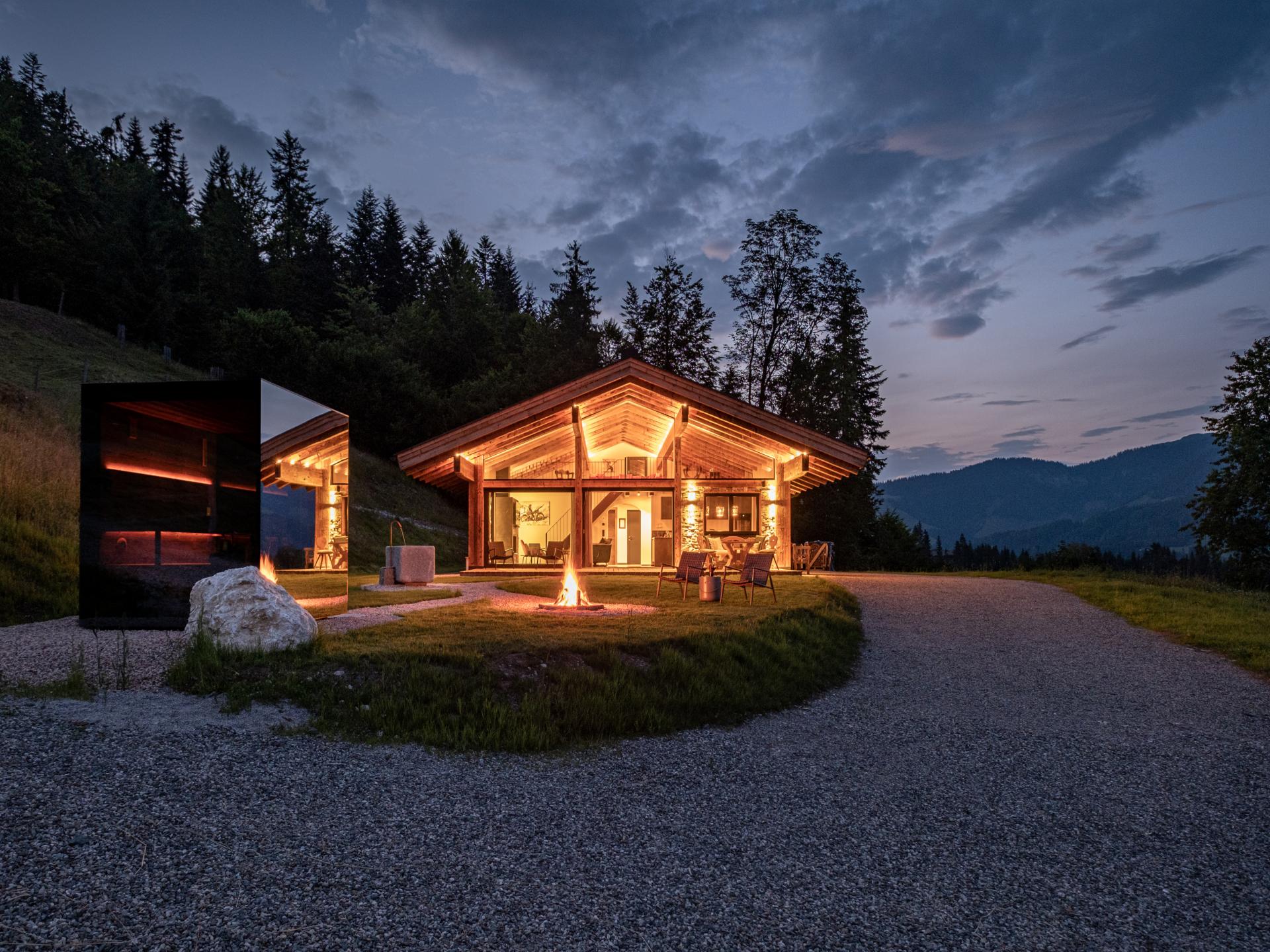 Luxe chalet in Sankt Johann met privé sauna en natuurlijke zwemvijver - foto 17