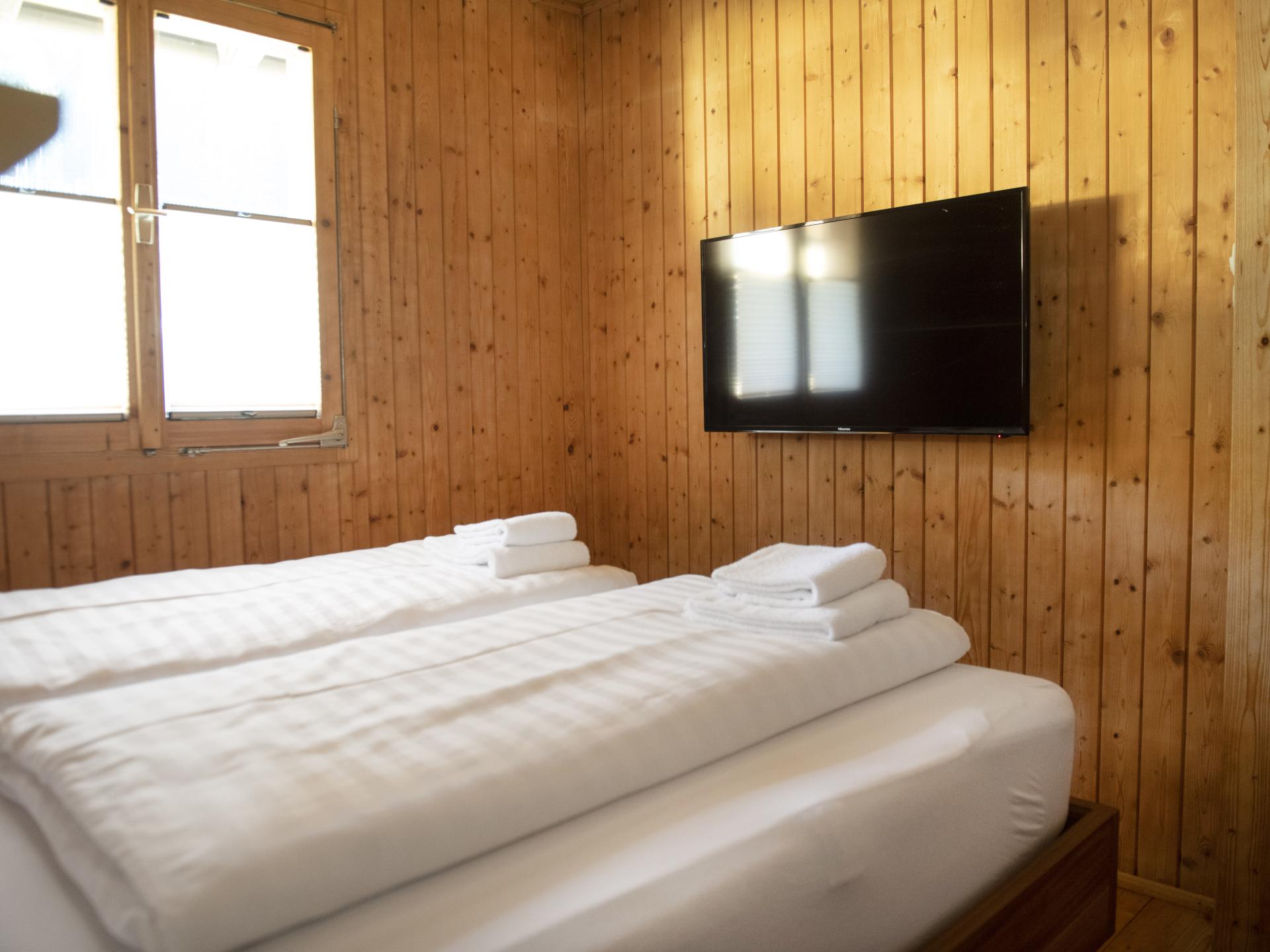 Vrijstaand chalet aan de piste in Pill met privétuin en houtkachel - foto 9
