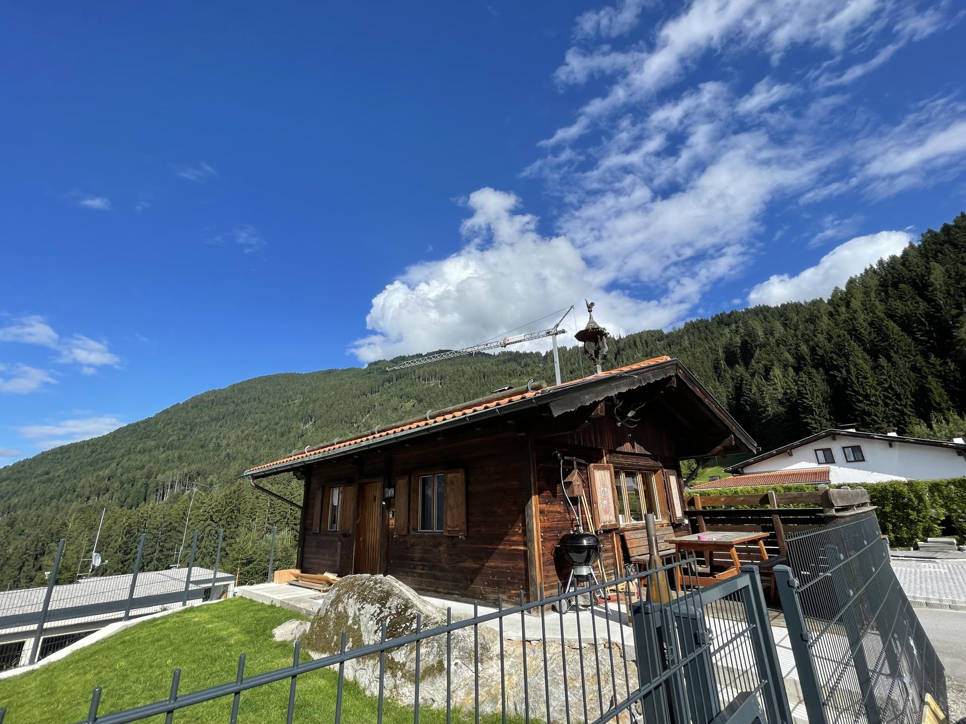 Vrijstaand chalet aan de piste in Pill met privétuin en houtkachel - foto 12
