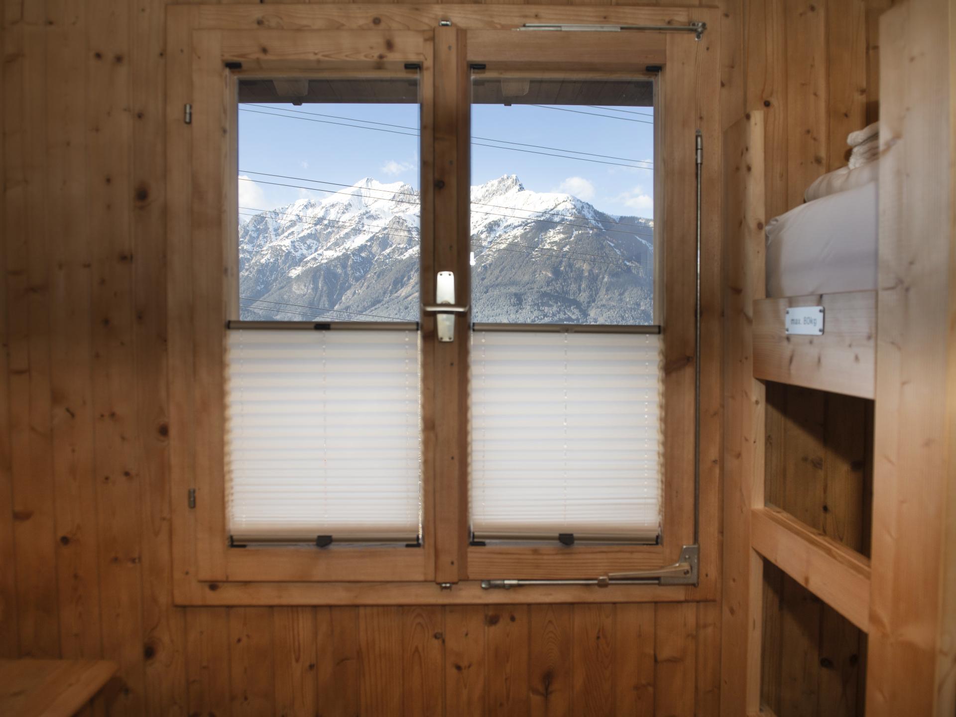 Vrijstaand chalet aan de piste in Pill met privétuin en houtkachel - foto 28