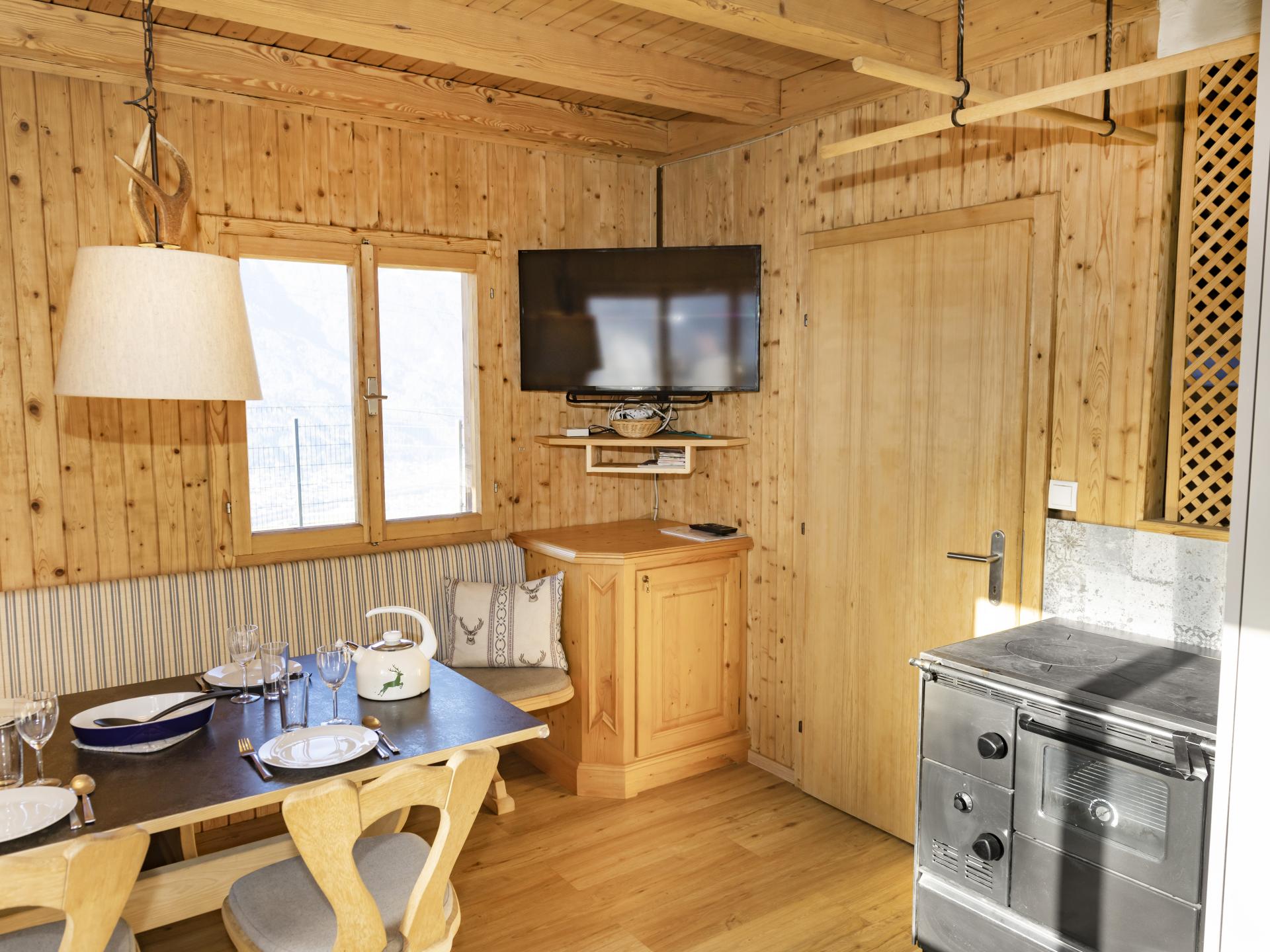 Vrijstaand chalet aan de piste in Pill met privétuin en houtkachel - foto 19