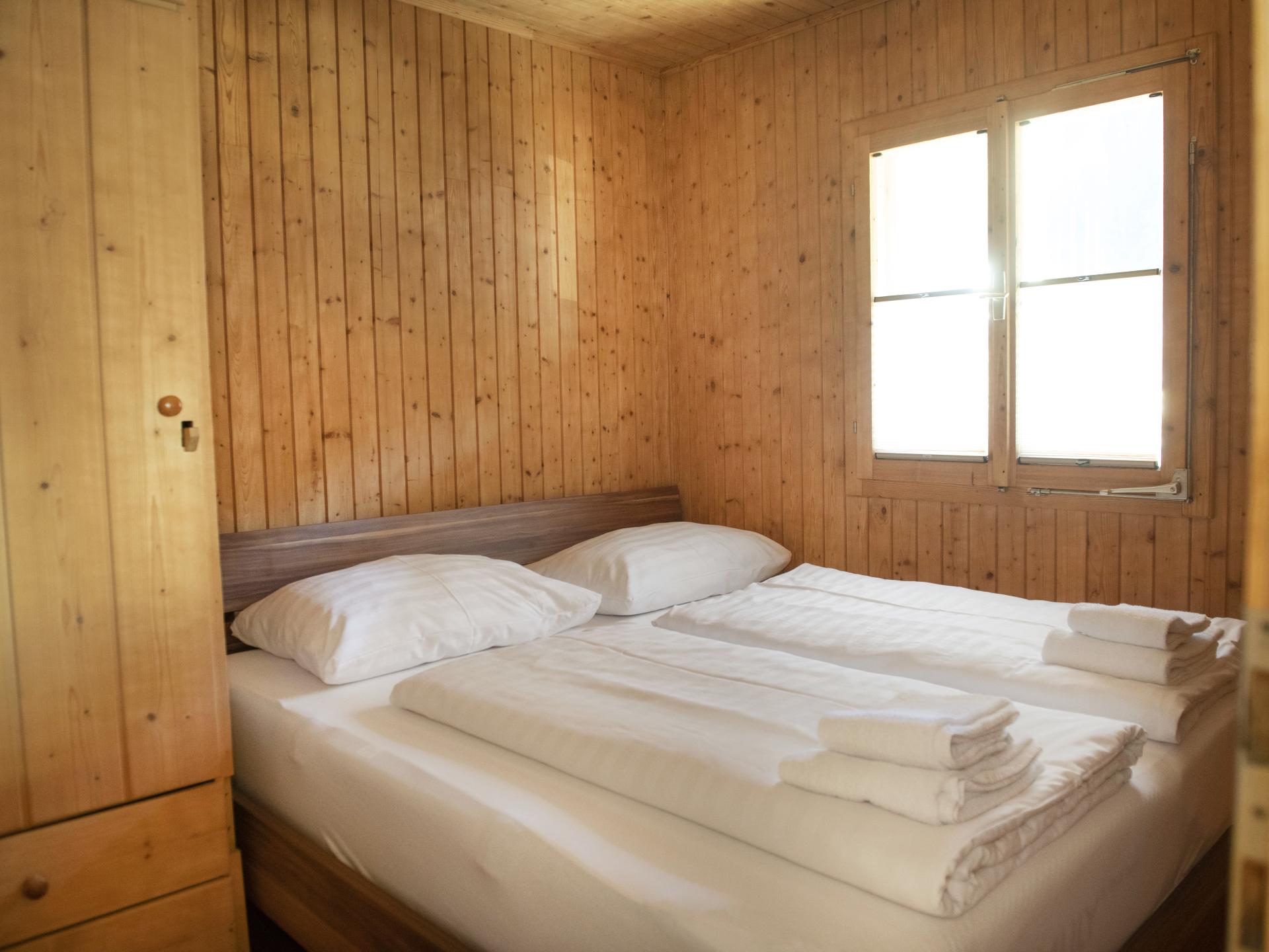 Vrijstaand chalet aan de piste in Pill met privétuin en houtkachel - foto 7