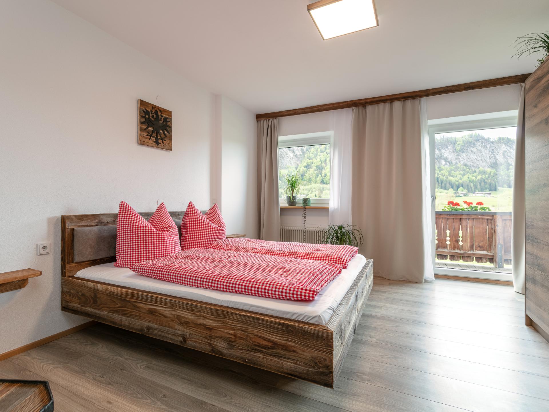 Ruim appartement op idyllische boerderij in Walchsee, vlakbij meer en skilift - foto 12