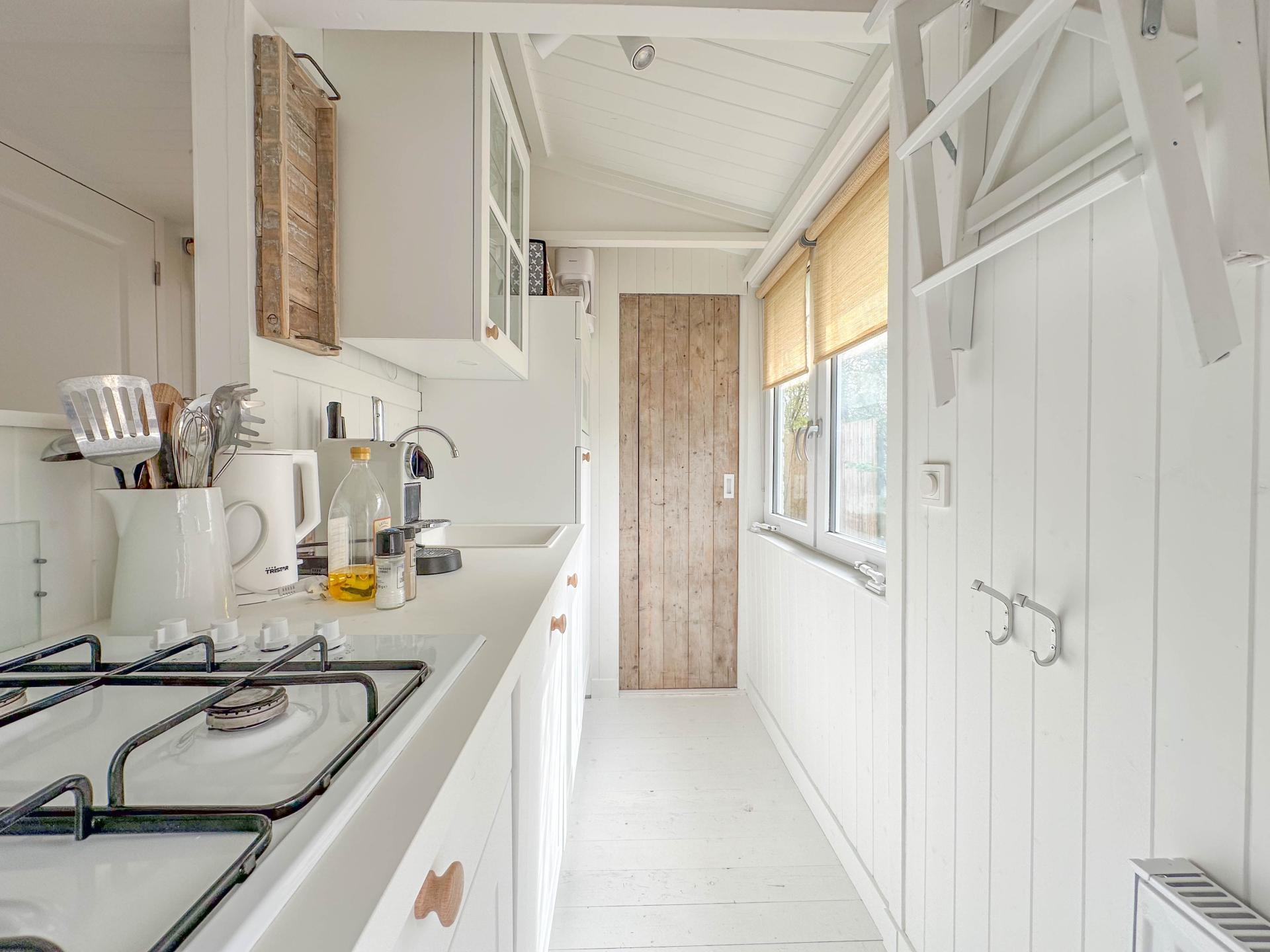 Design strandhuisje met omheinde tuin op autovrij park in Callantsoog - foto 11