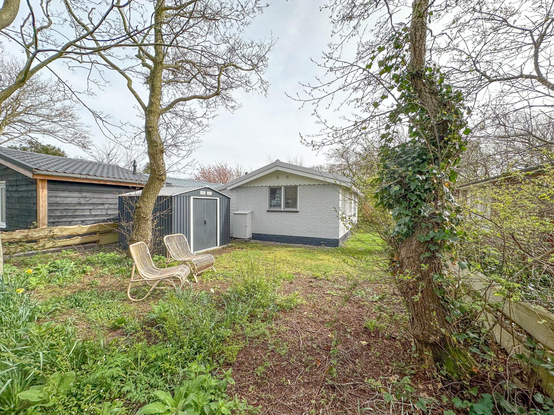 Design strandhuisje met omheinde tuin op autovrij park in Callantsoog - foto 29