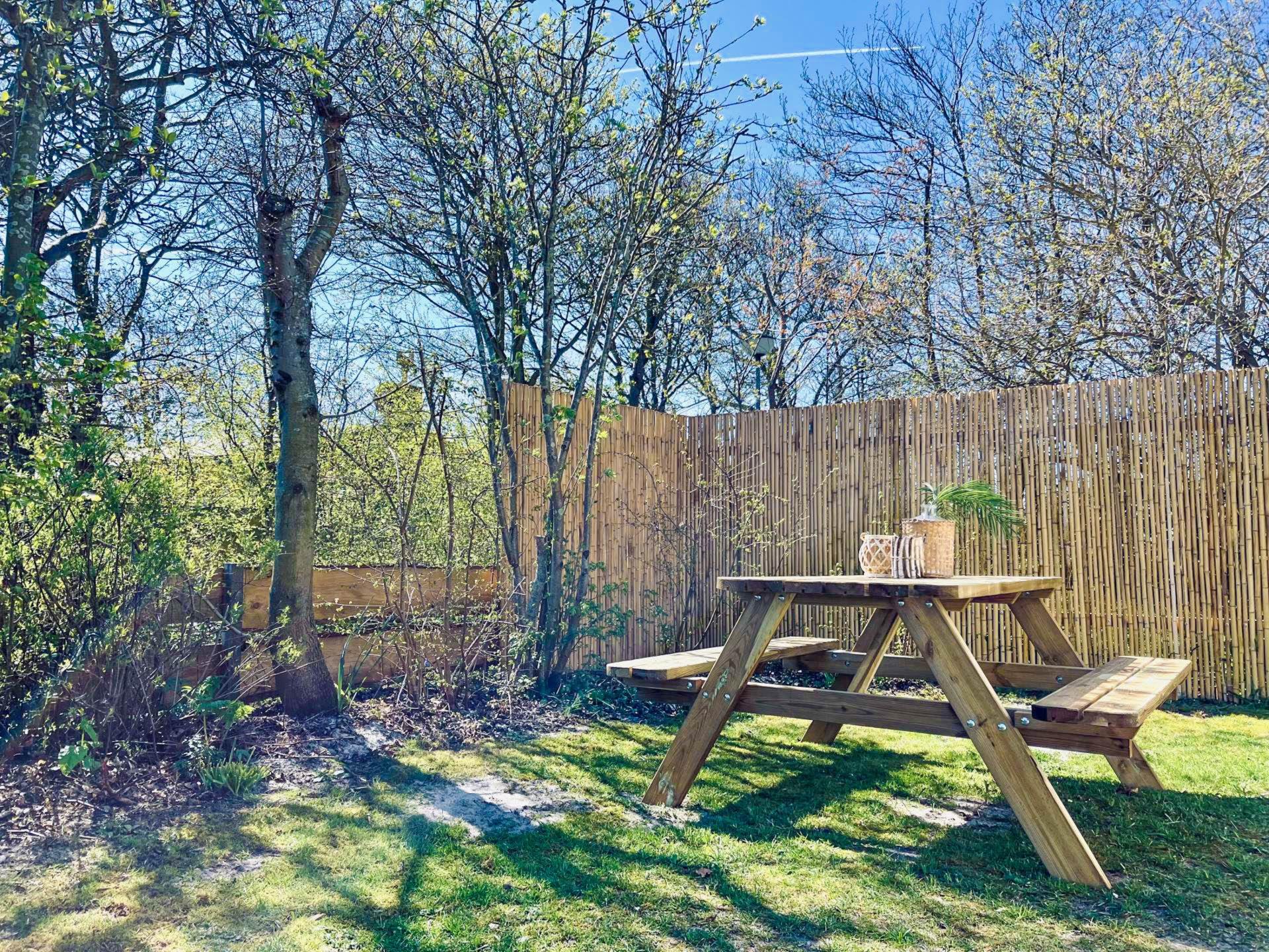 Design strandhuisje met omheinde tuin op autovrij park in Callantsoog - foto 31