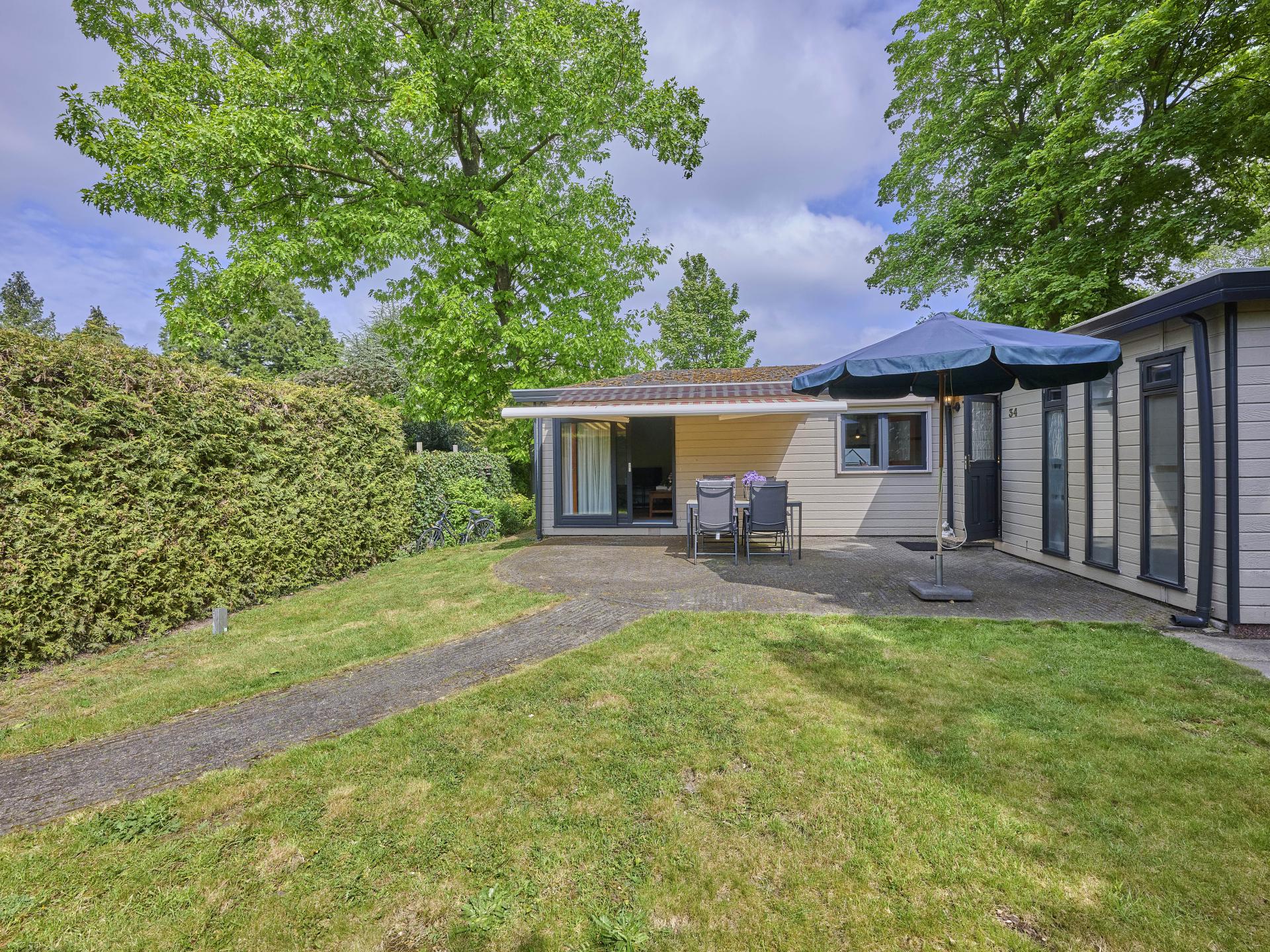 Huisdiervriendelijk chalet met omheinde tuin op Bospark de Wervelwind - foto 34
