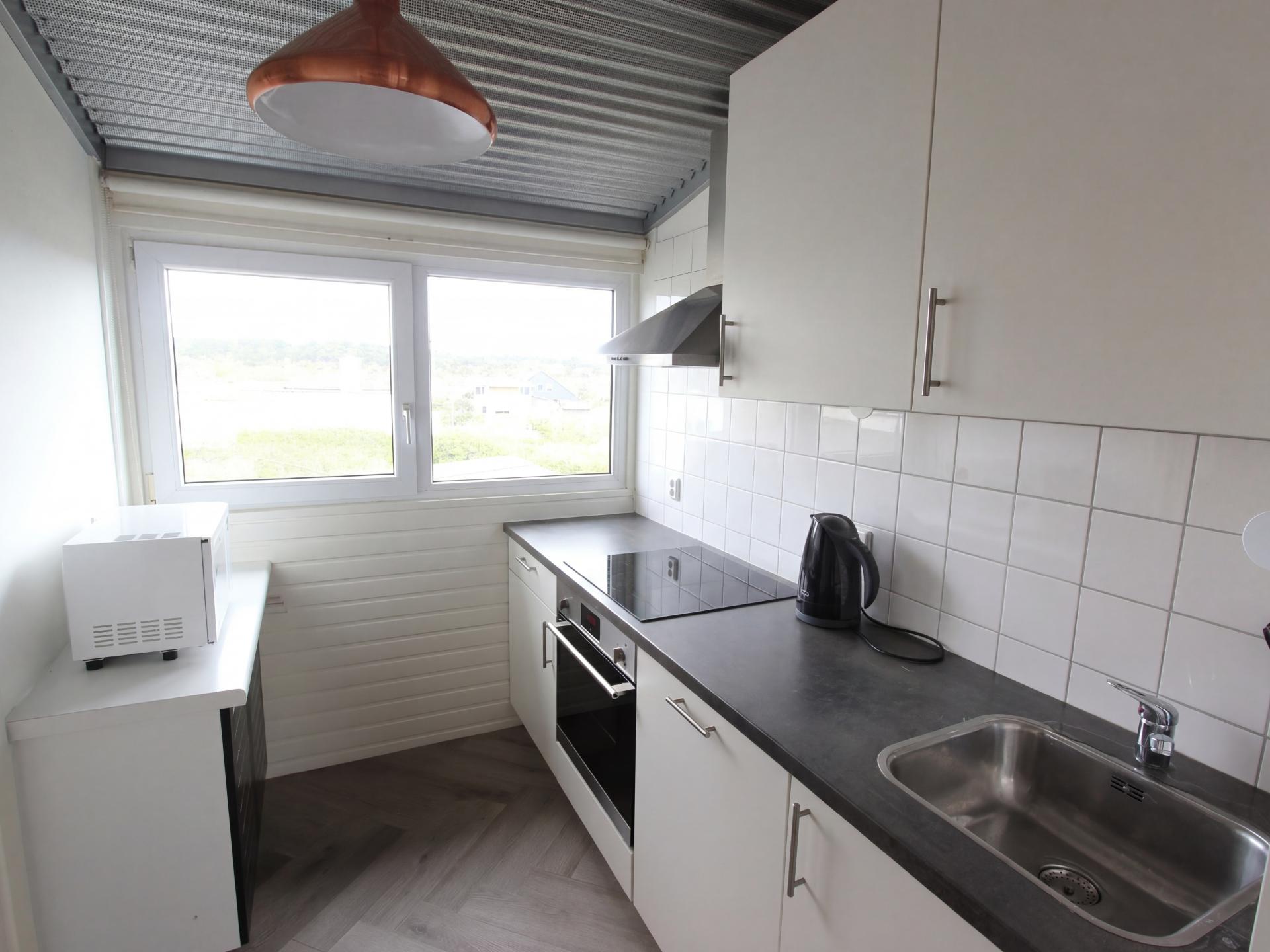 Strandappartement Bergen aan Zee met zeezicht en eigen parkeerplaats - foto 22