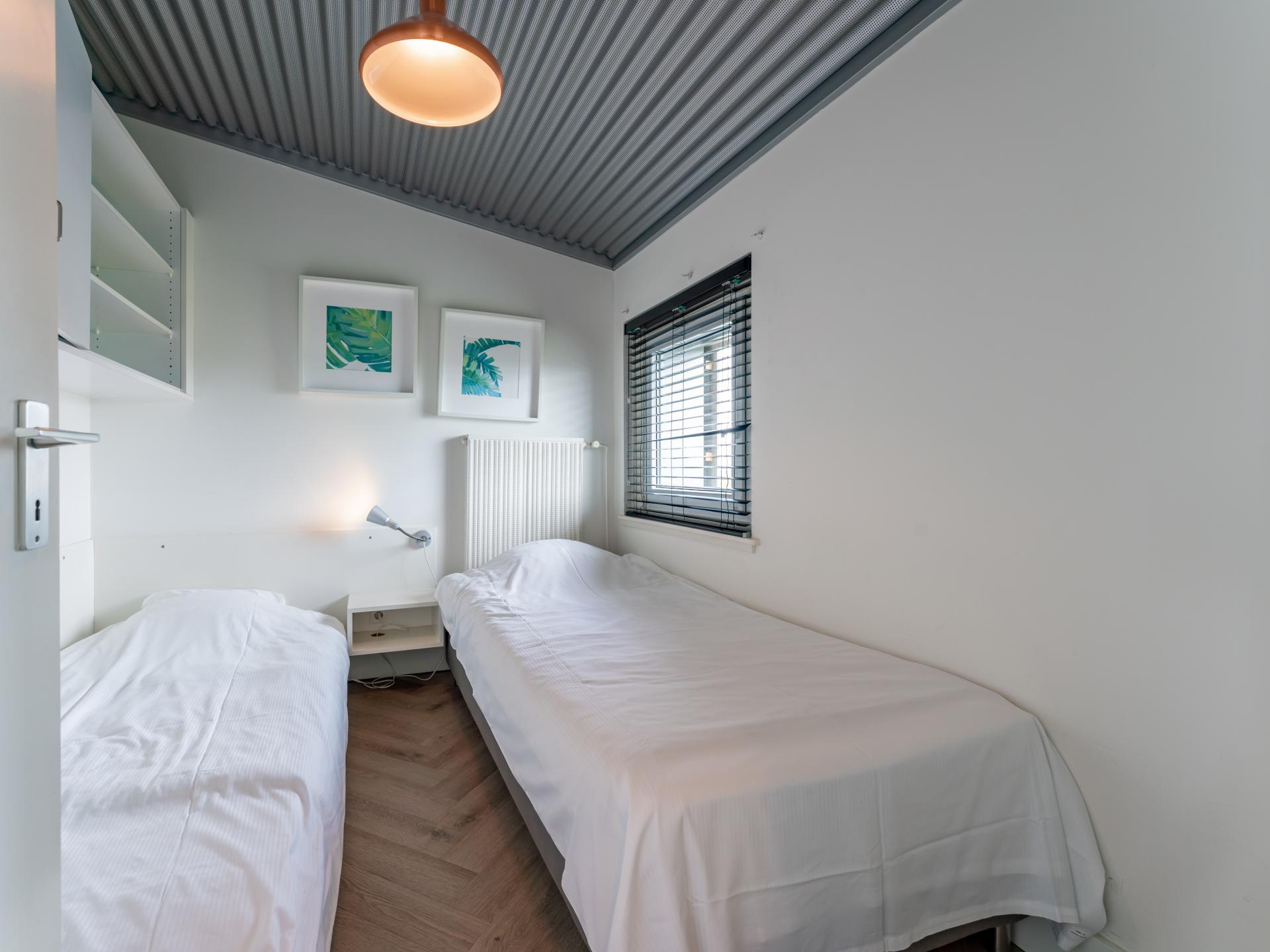 Strandappartement Bergen aan Zee met zeezicht en eigen parkeerplaats - foto 16