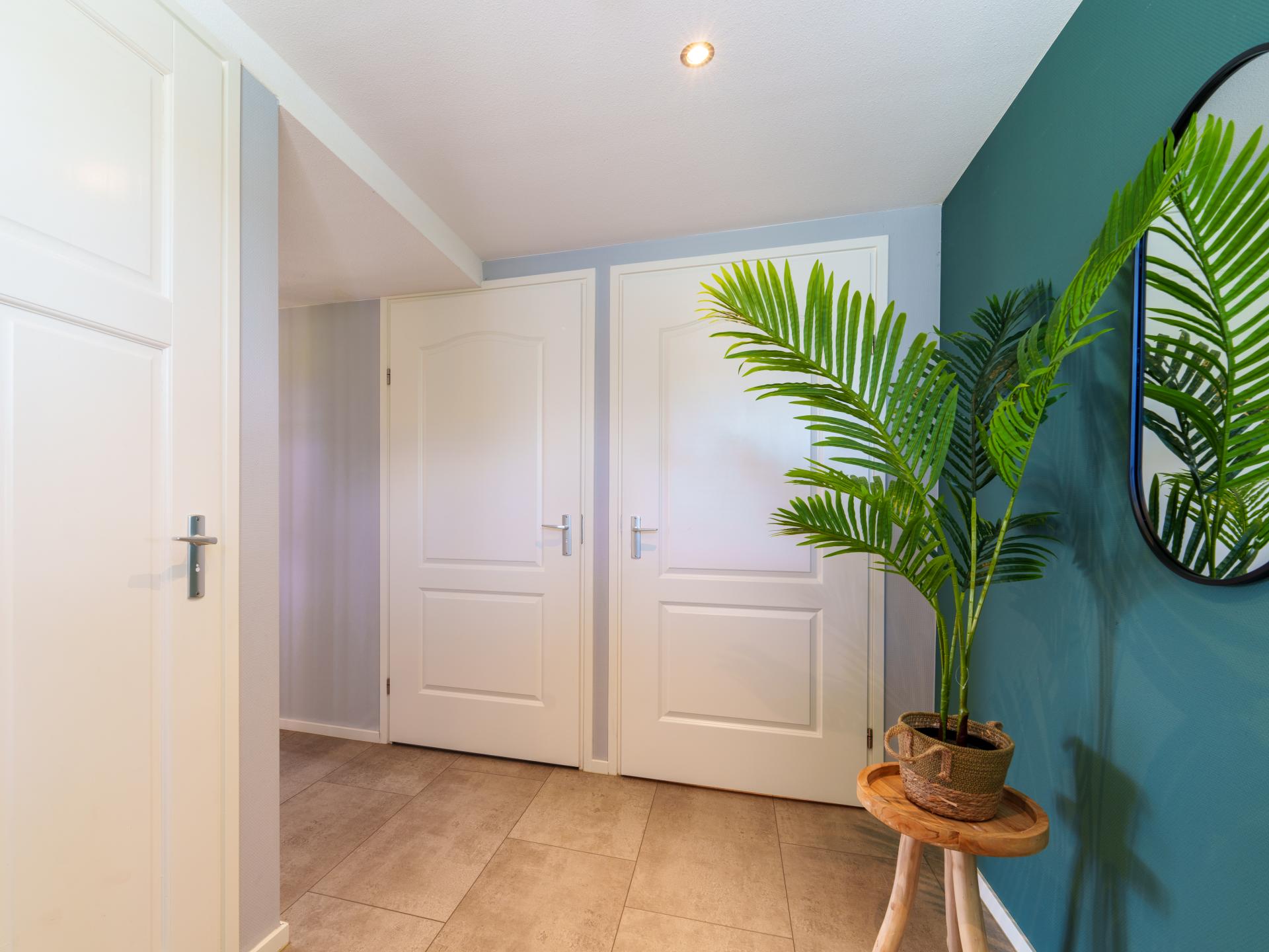 Reggezicht: nieuw vakantiehuis met enorme tuin in hartje Hellendoorn - foto 9
