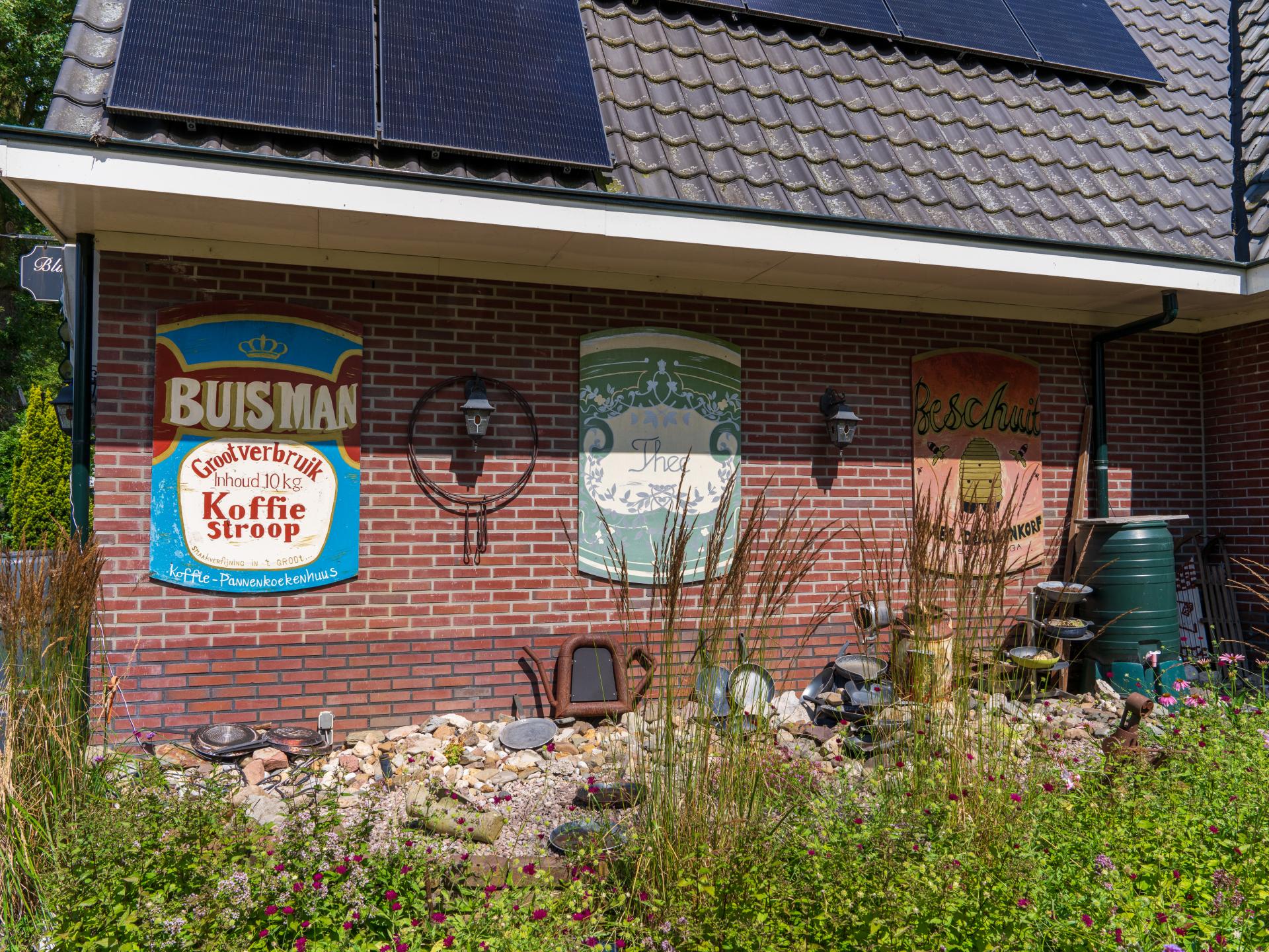 Reggezicht: nieuw vakantiehuis met enorme tuin in hartje Hellendoorn - foto 13