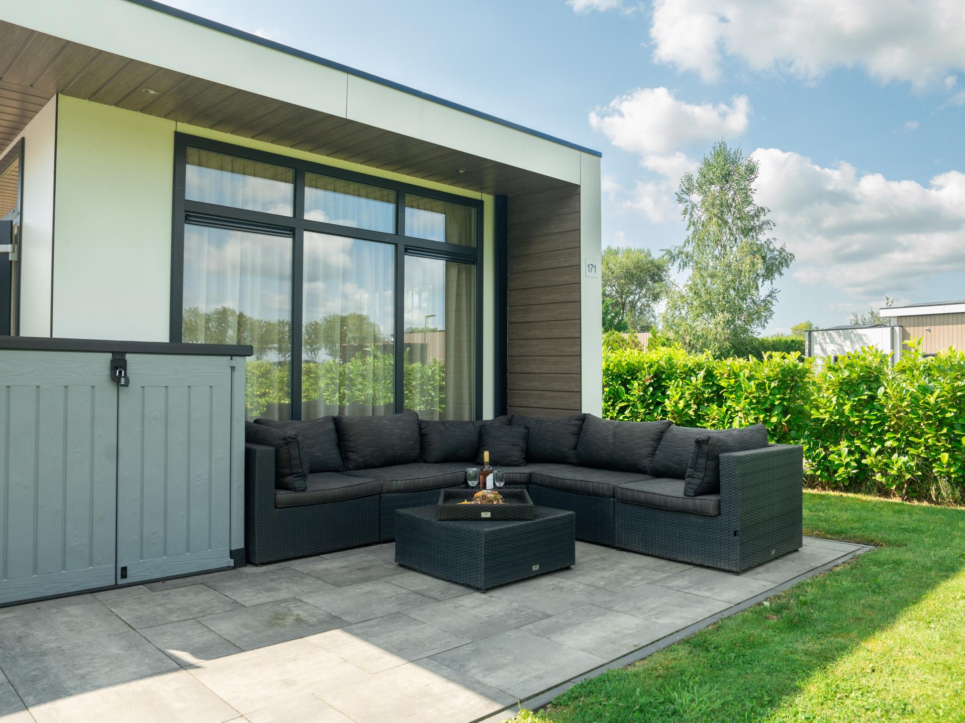 Moderne chalet met zonnige tuin op rustig park in Molenschot, nabij Efteling - foto 7