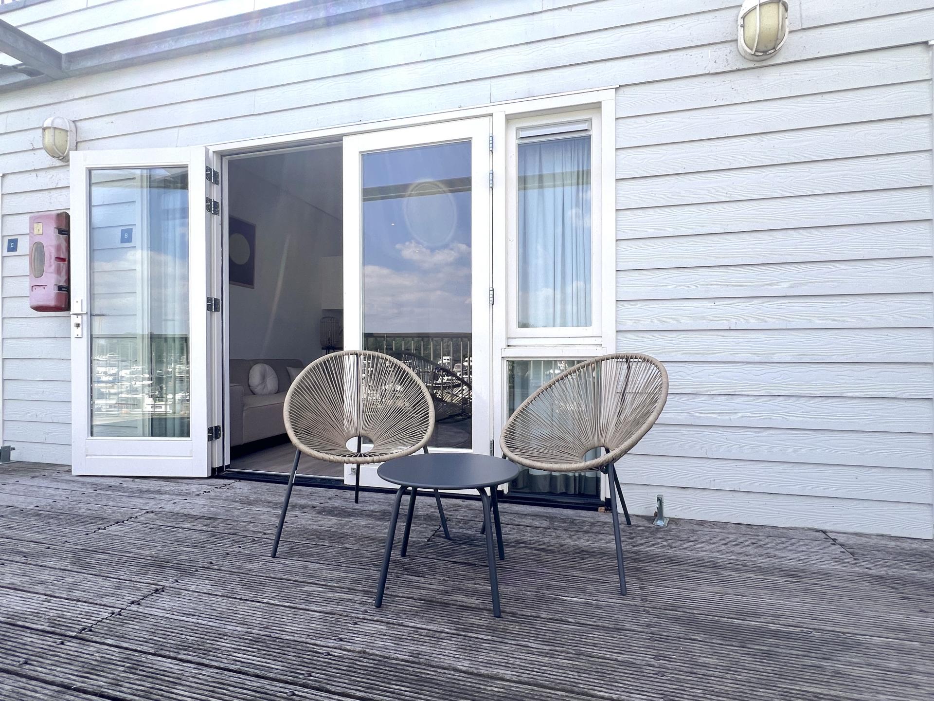 Luxe waterside appartement Maasbommel met havenzicht en terras - foto 26