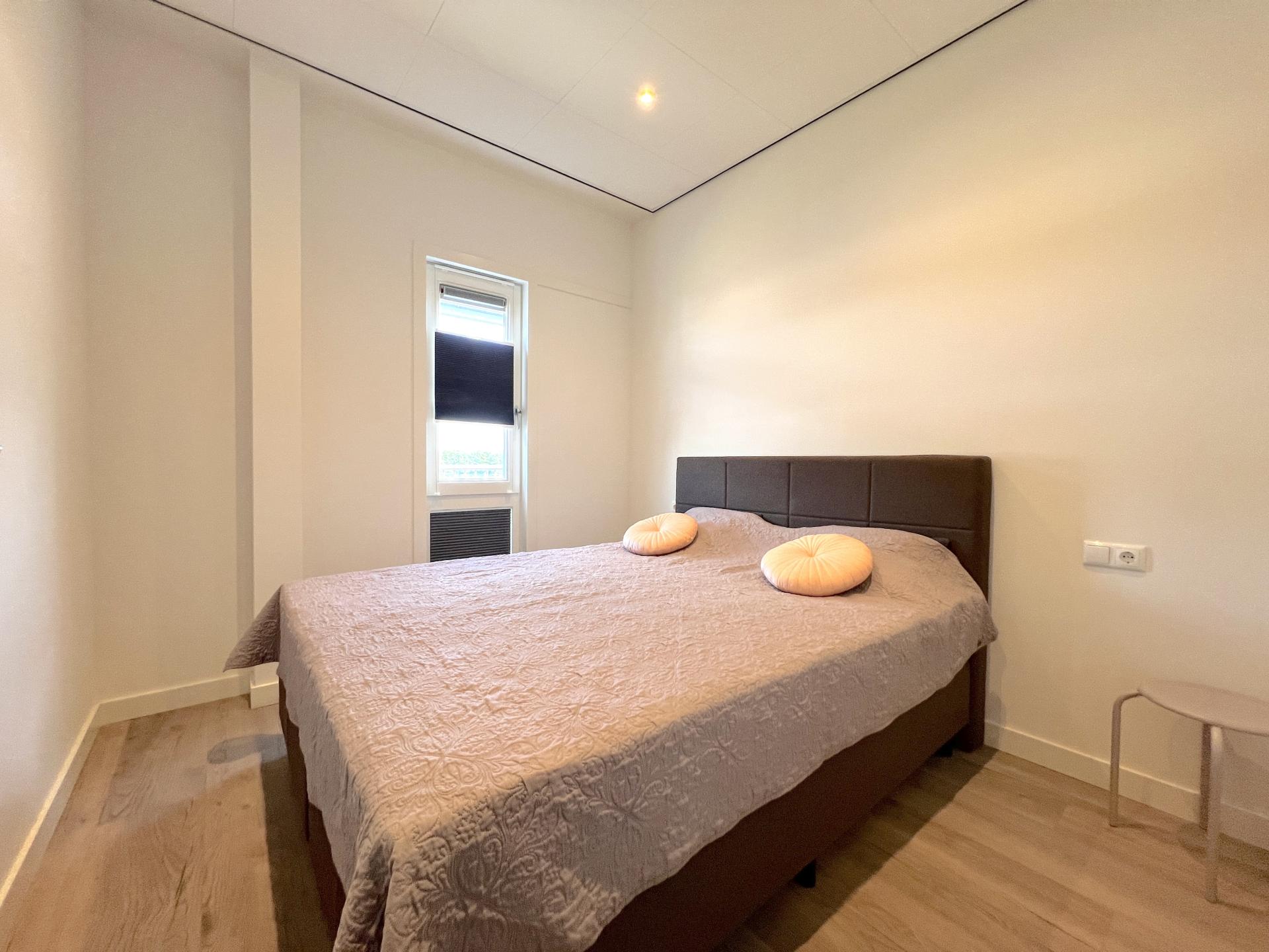 Luxe waterside appartement Maasbommel met havenzicht en terras - foto 19