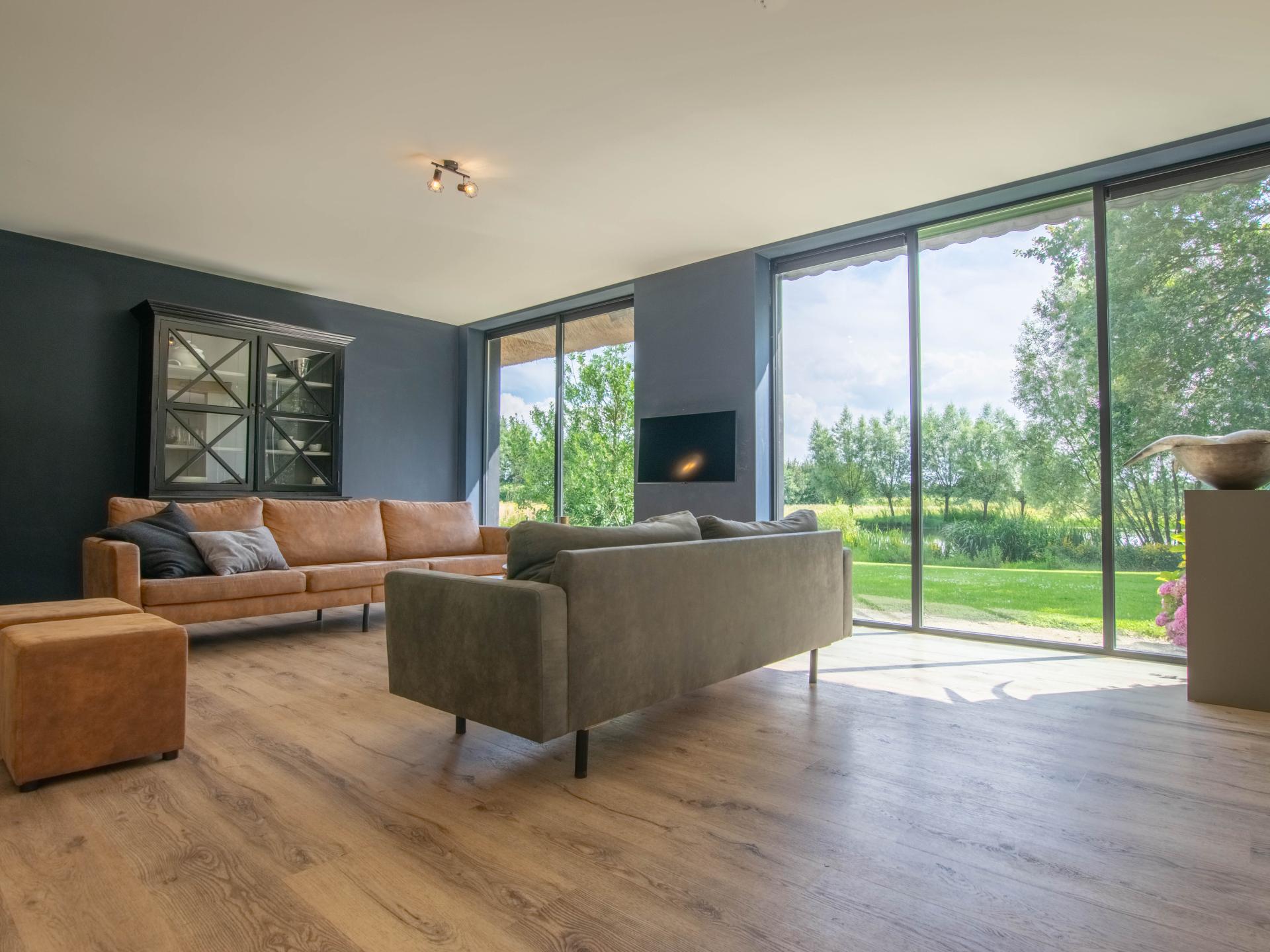 Vrijstaande villa met hottub en panoramisch uitzicht over natuurgebied - foto 7
