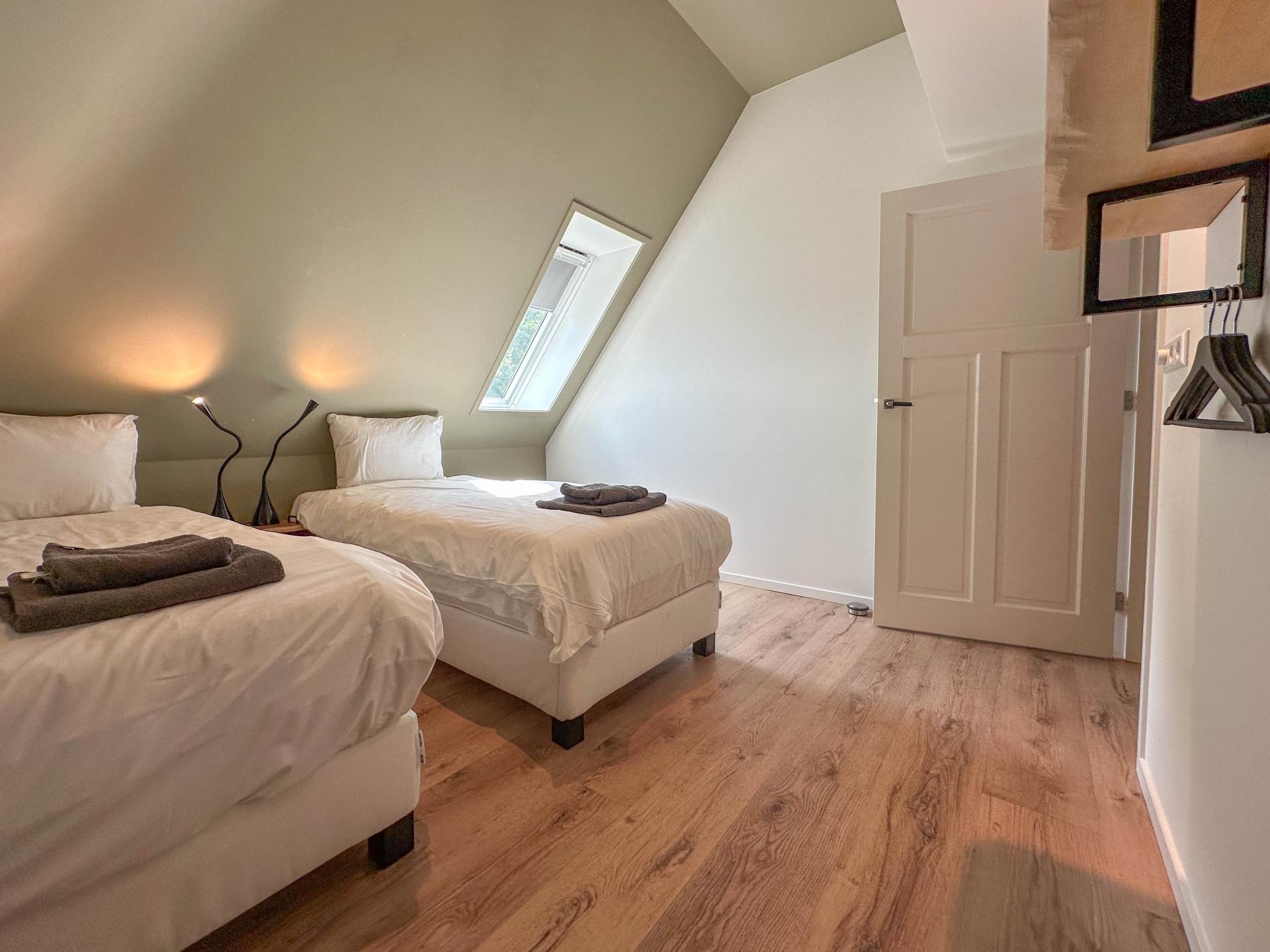 Vrijstaande villa met hottub en panoramisch uitzicht over natuurgebied - foto 30