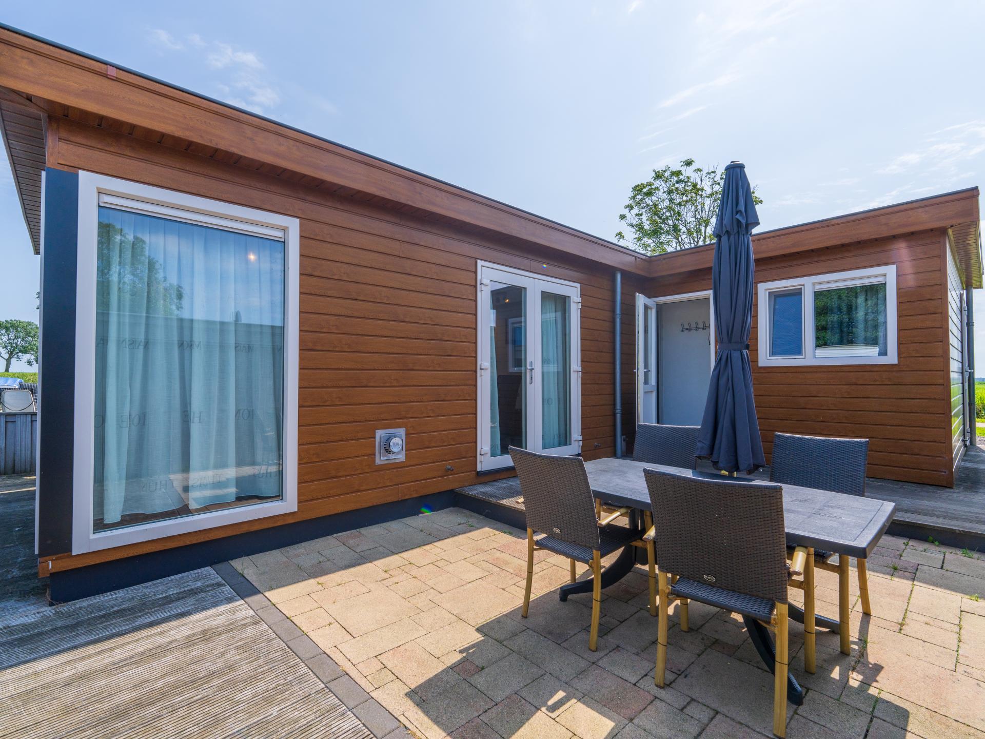 Luxe chalet aan het water met eigen sloep in hartje Friesland - foto 23