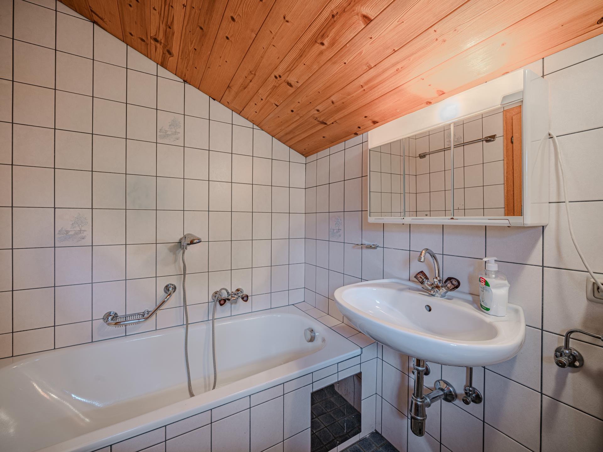 Appartement direct aan de piste in Sankt Johann met terras - foto 11