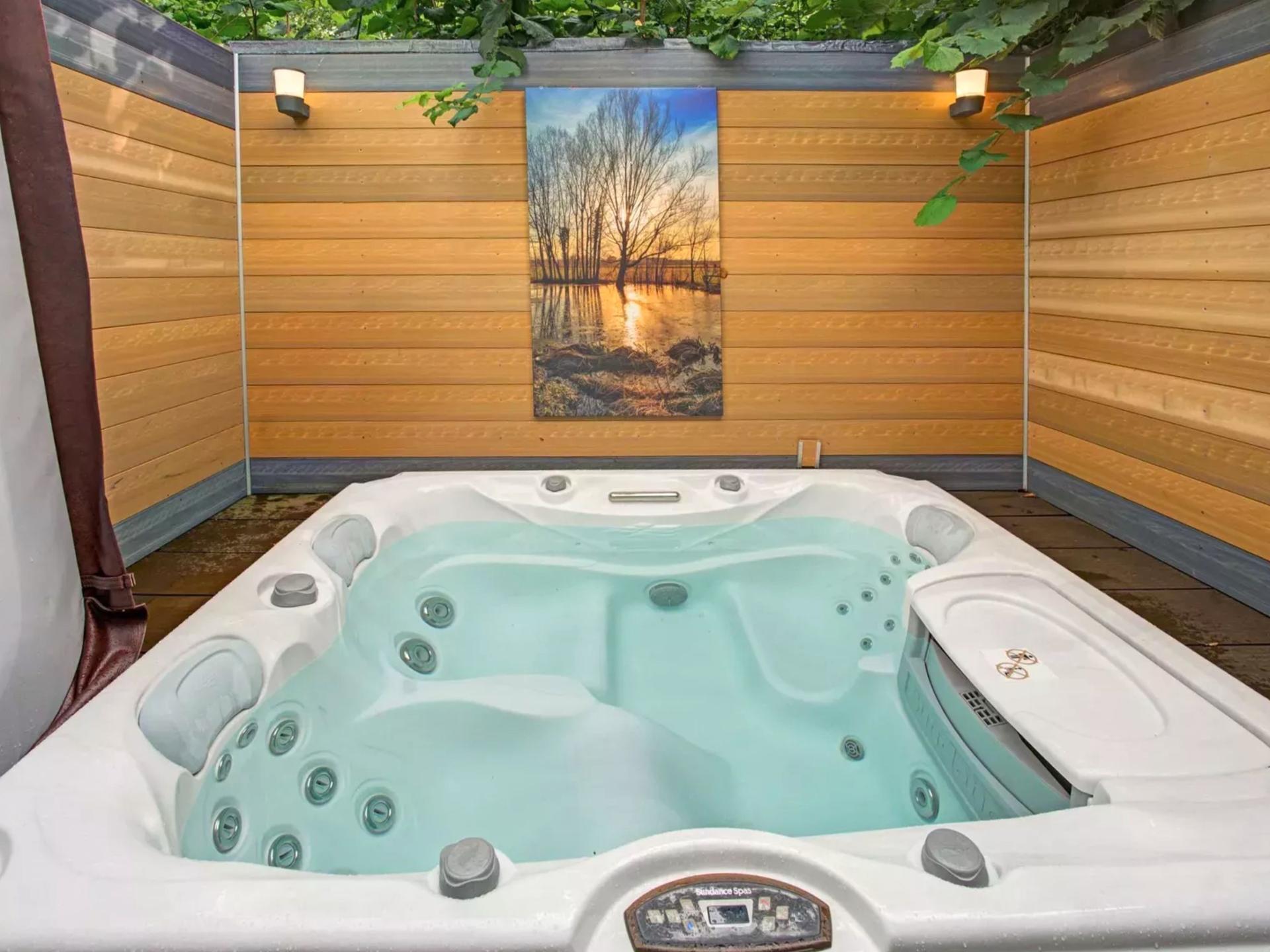 Romantisch vakantiehuis met jacuzzi in de bossen bij Oldenzaal - foto 11