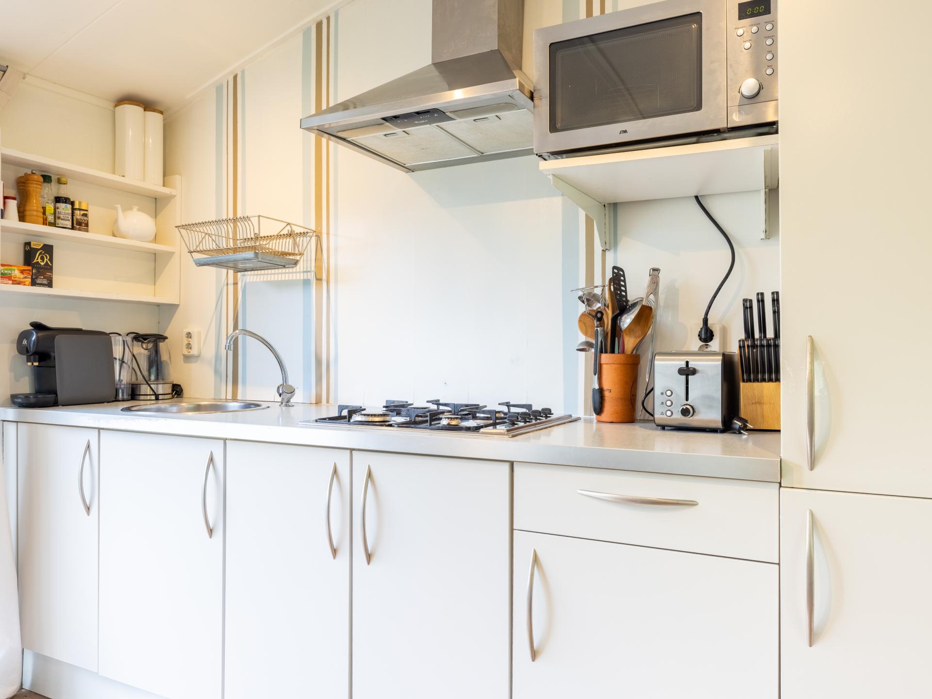 Vrijstaand vakantiehuis in groene weide bij kunstenaarsdorp Bergen - foto 12